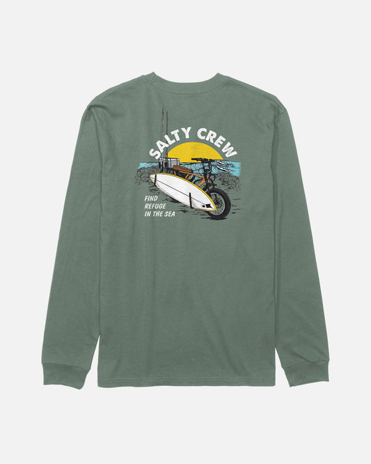 The Salty Crew Beach Cruiser Boys Long Sleeve Tee in Laurel Wreath is a green, combed ringspun cotton t-shirt featuring a screenprinted graphic of a small boat on the water, a yellow sun, and the text “SALTY CREW” above with “FIND REFUGE IN THE SEA” below the image on the back.