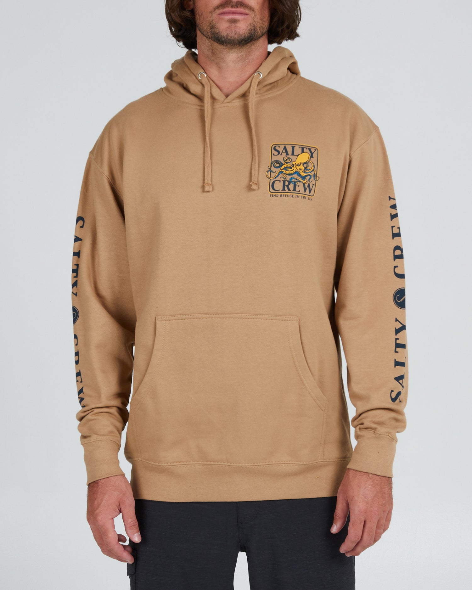 On body front of the Ink Slinger Sandstone Hood fleece