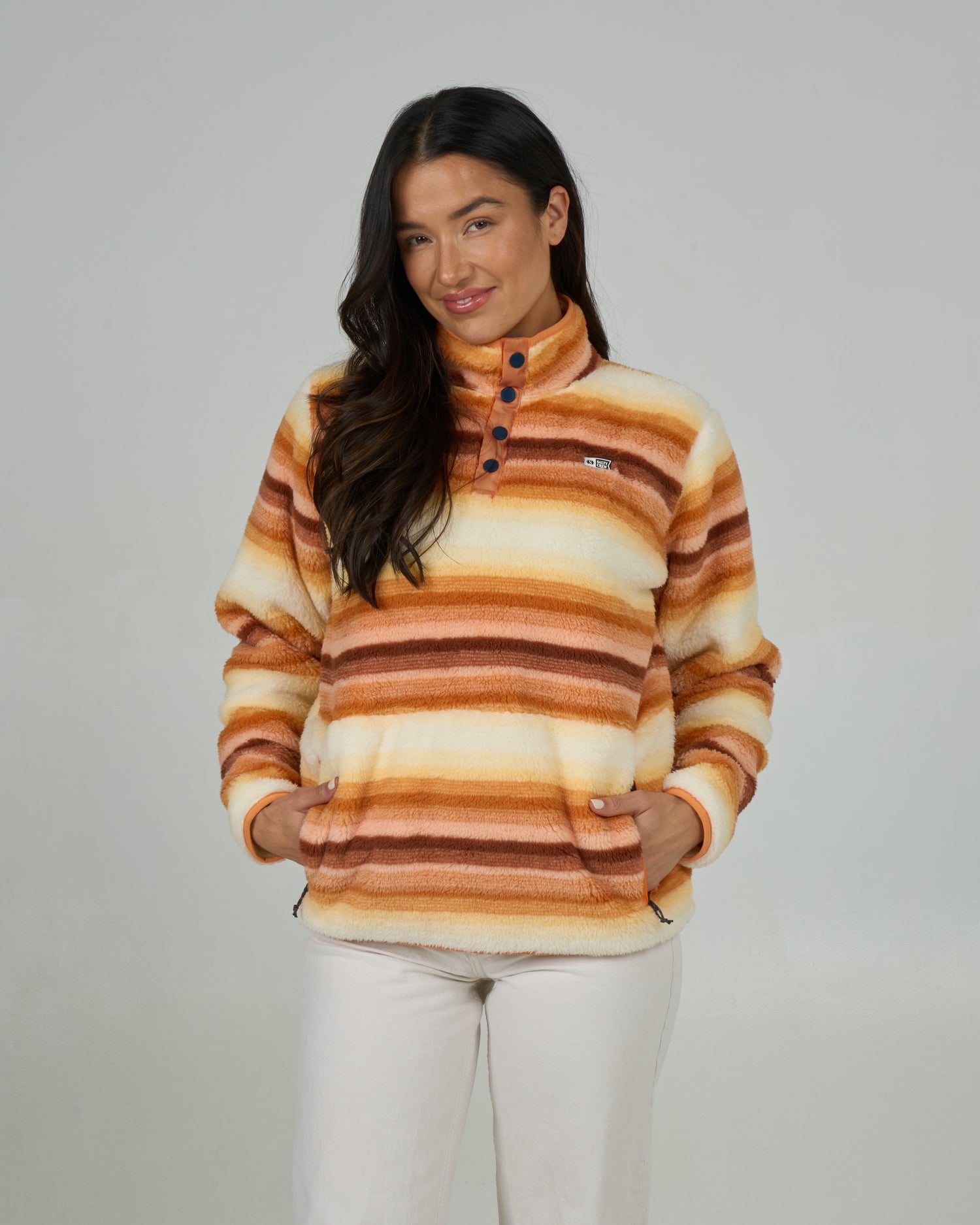 On body front view of the Calm Seas Pullover - Peach Fizz. 