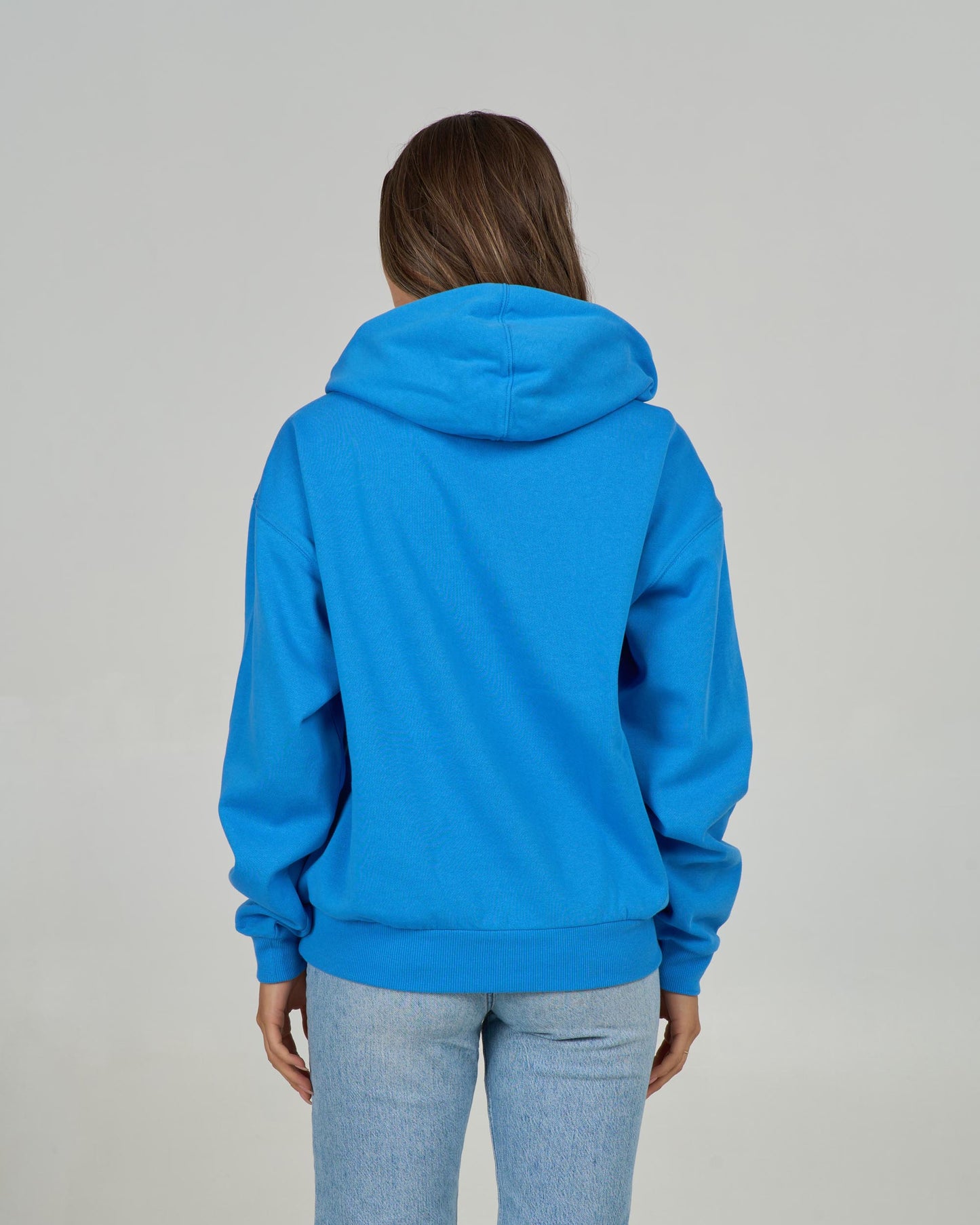 Back view of the Unscripted Hoody - Bold Blue. 