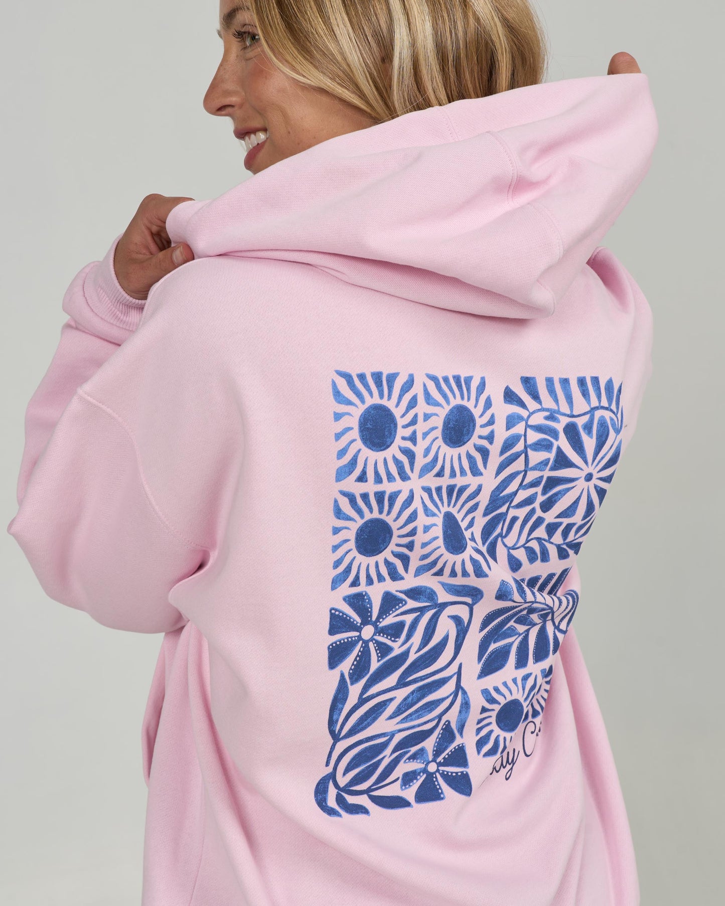 Close up back shot of the Sunblock Hoody - Pink Skies. 