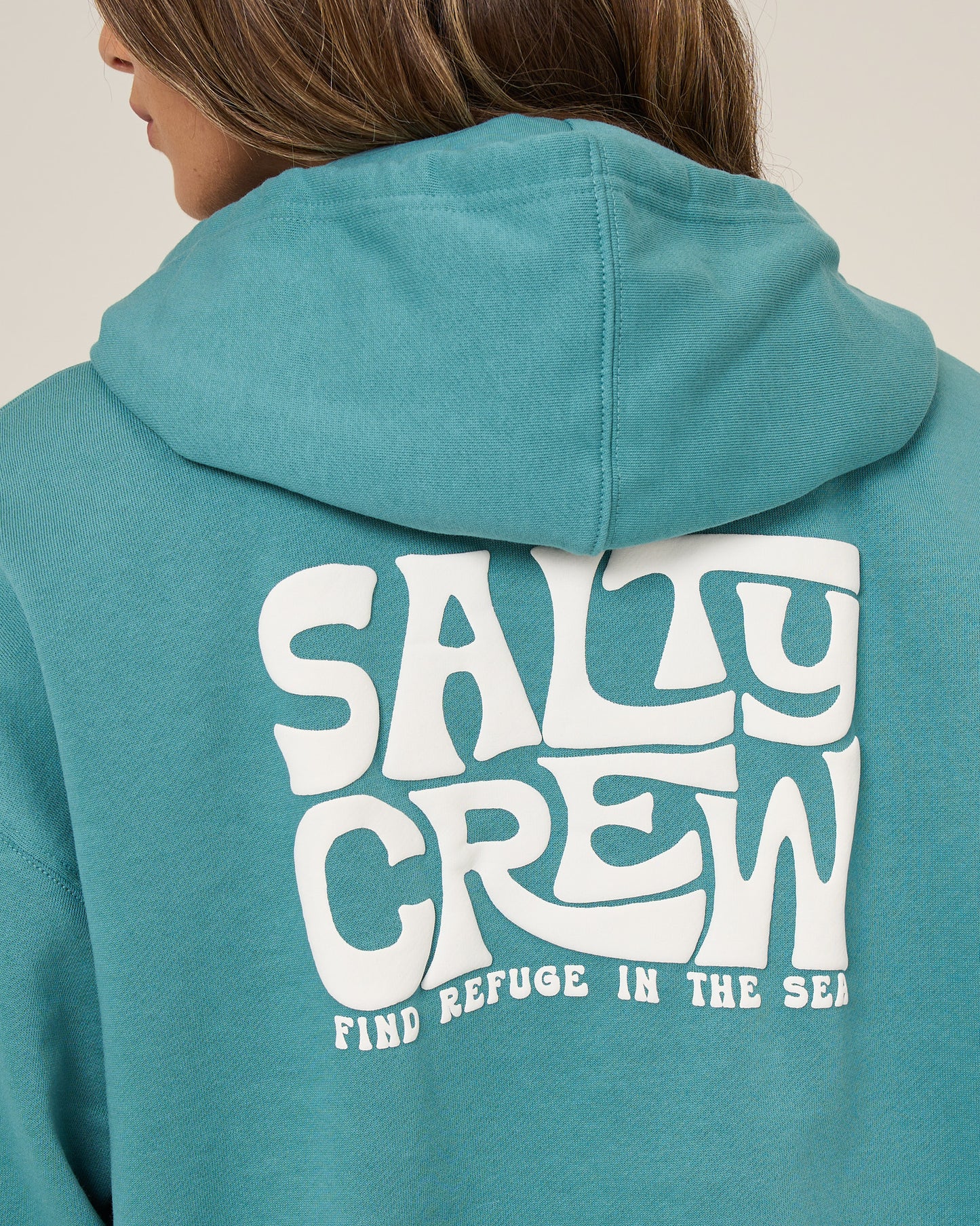 Close up back view of the Freestyle Hoodie - Teal. 