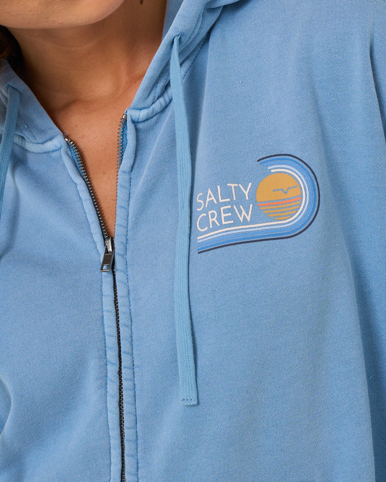 Close up front view of the Ombre Wave Hooded Zip - Ash Blue. 