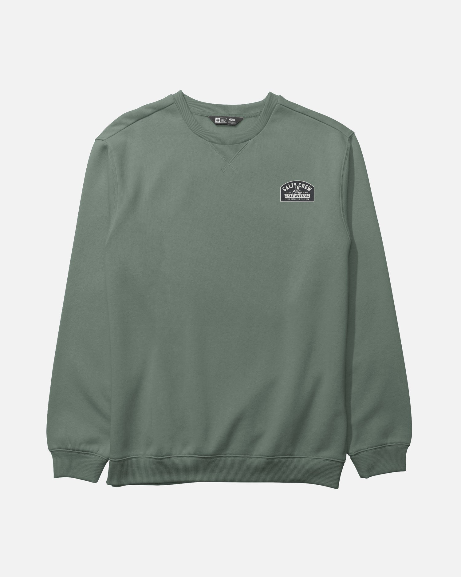 Introducing the Salty Crew Crafted Crew Fleece in Laurel Wreath—a green mid-weight sweatshirt made from a soft cotton-polyester blend. This crewneck features ribbed cuffs and hem, a classic V-stitch gusset at the collar, and a small black and white patch on the left chest that reads “Valley Peak Originals.” Displayed against a plain white background.