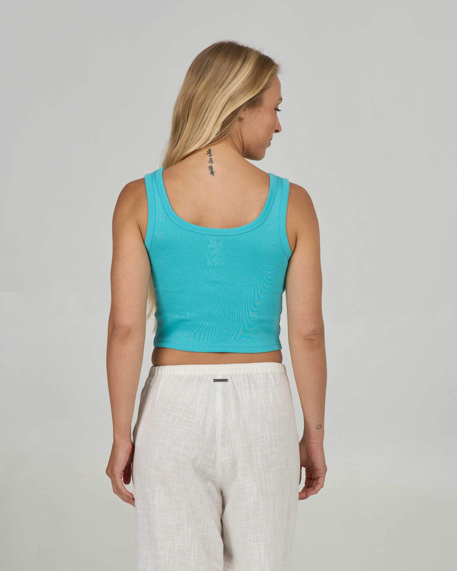 Back view of the Out To Sea Tank - Turquoise. 