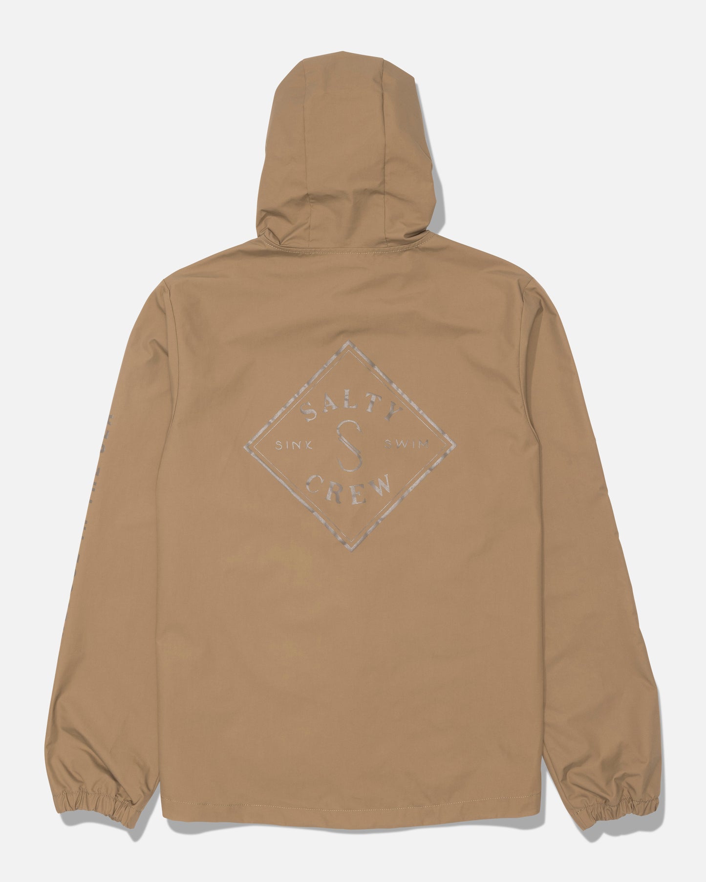 Washed brown Tippet Snap Jacket by Salty Crew, featuring elastic cuffs and a durable nylon shell, finished with a white diamond-shaped Salty Crew Sink or Swim screenprint on the back.