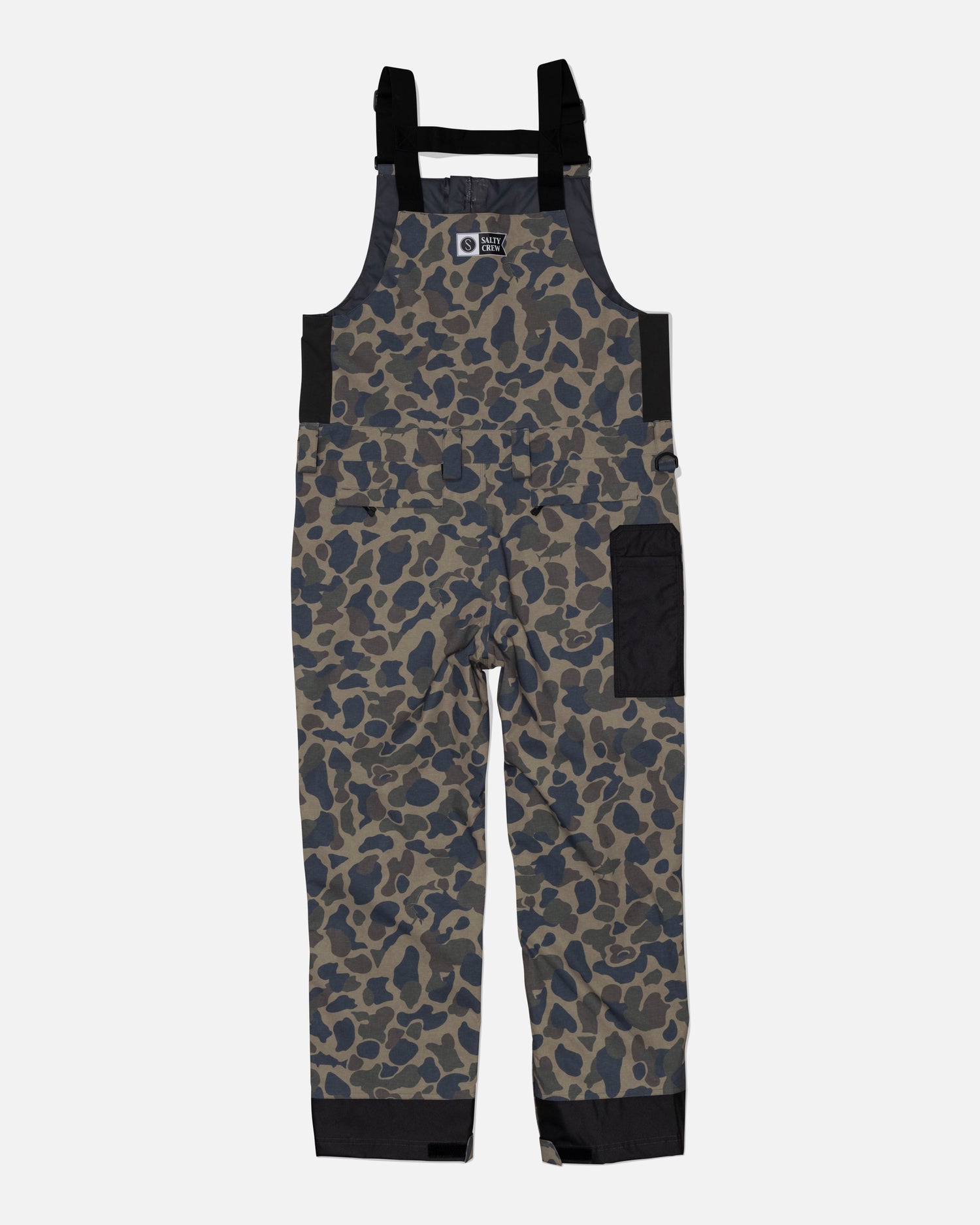 The Salty Crew Long Range Tech Bib - Sand Camo features black adjustable straps, a chest pocket flap, a large side pocket, reinforced black ankle panels, and a front zipper for durability and long-lasting performance.
