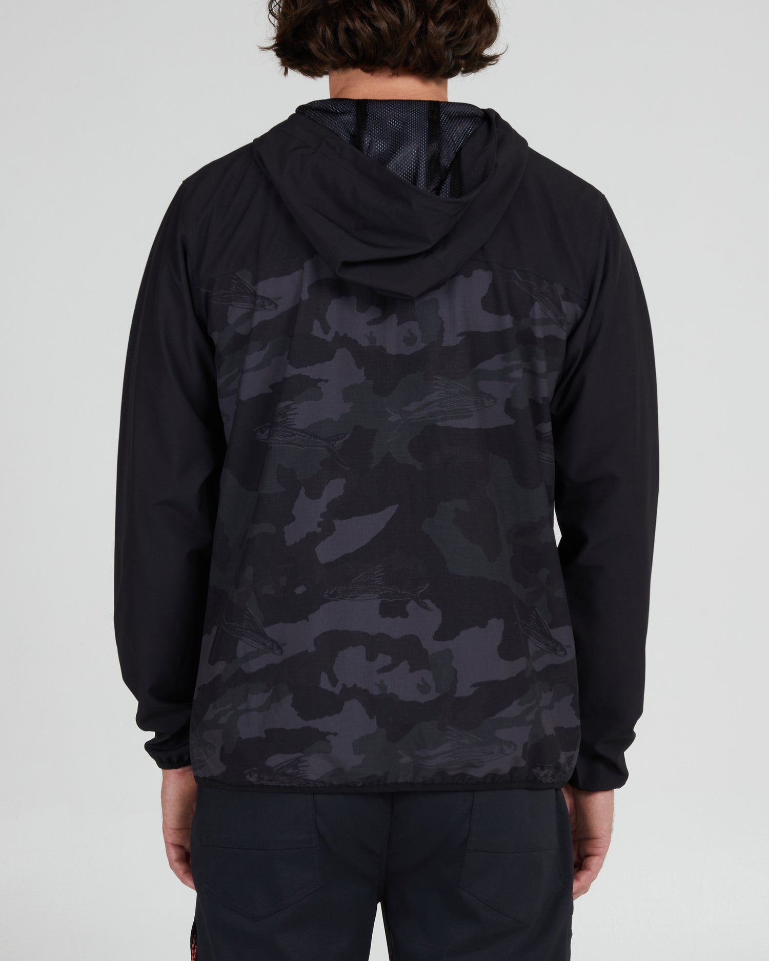 back view of Stowaway Black Camo Jacket