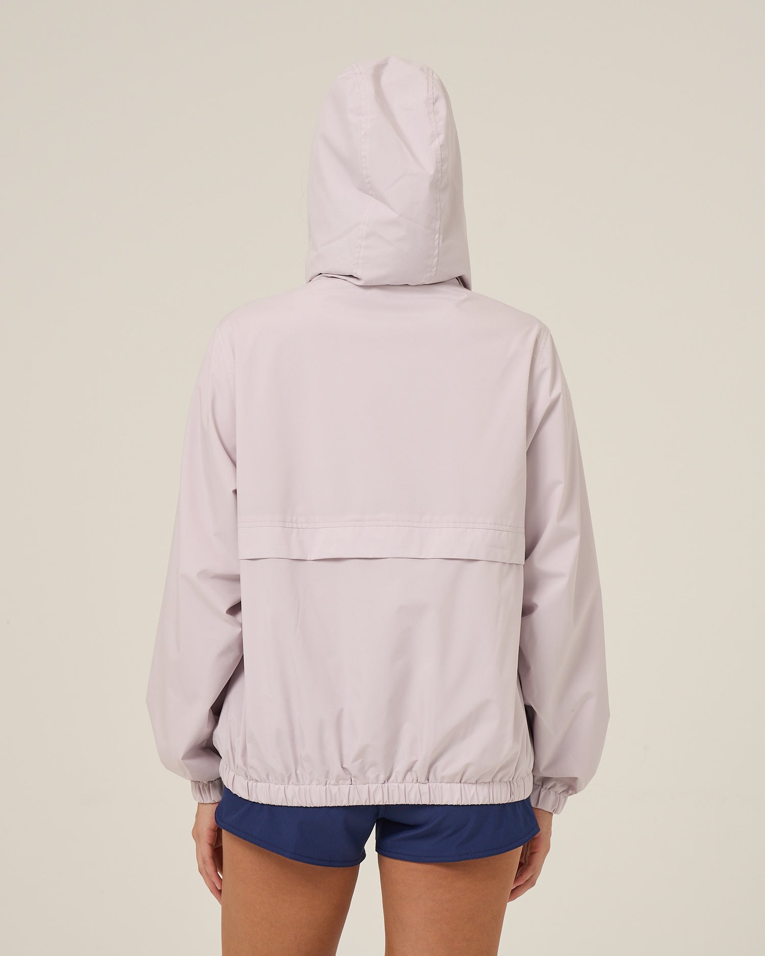 Back view of the Barrier Windbreaker - Lilac Fog. 