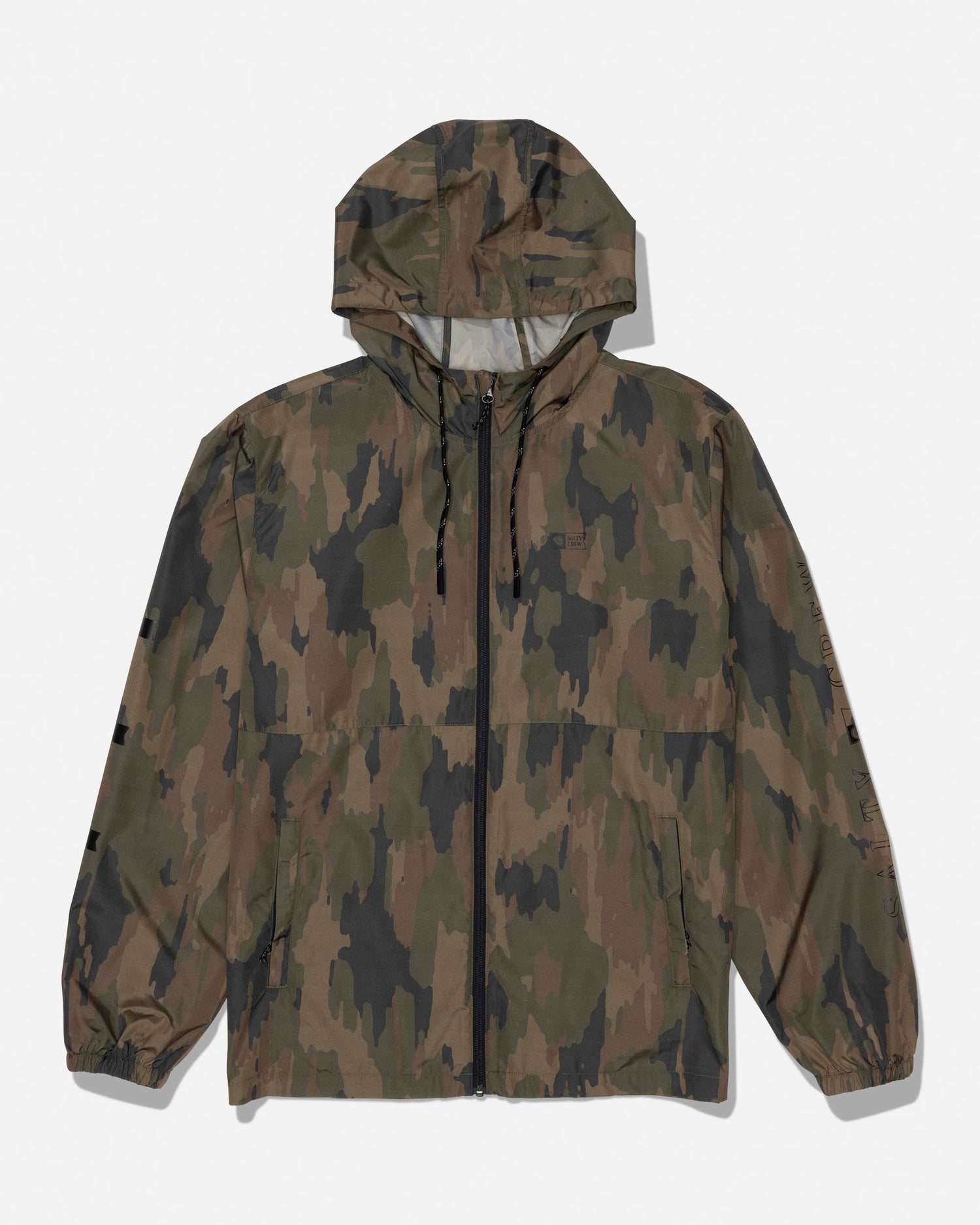 The Salty Crew Surface Windbreaker Jacket - Ranger, featuring a camouflage pattern, is crafted from polyester and includes a front zipper, zippered pockets, drawstring hood, and elastic cuffs. It is displayed laid flat on a plain white background.