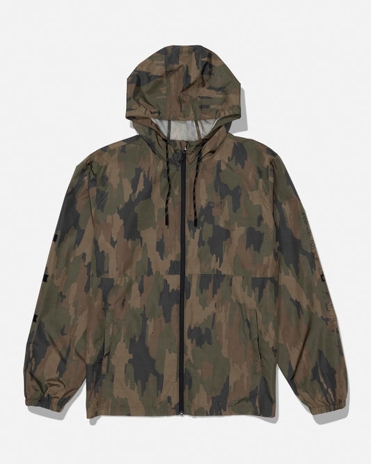 The Salty Crew Surface Windbreaker Jacket - Ranger, featuring a camouflage pattern, is crafted from polyester and includes a front zipper, zippered pockets, drawstring hood, and elastic cuffs. It is displayed laid flat on a plain white background.