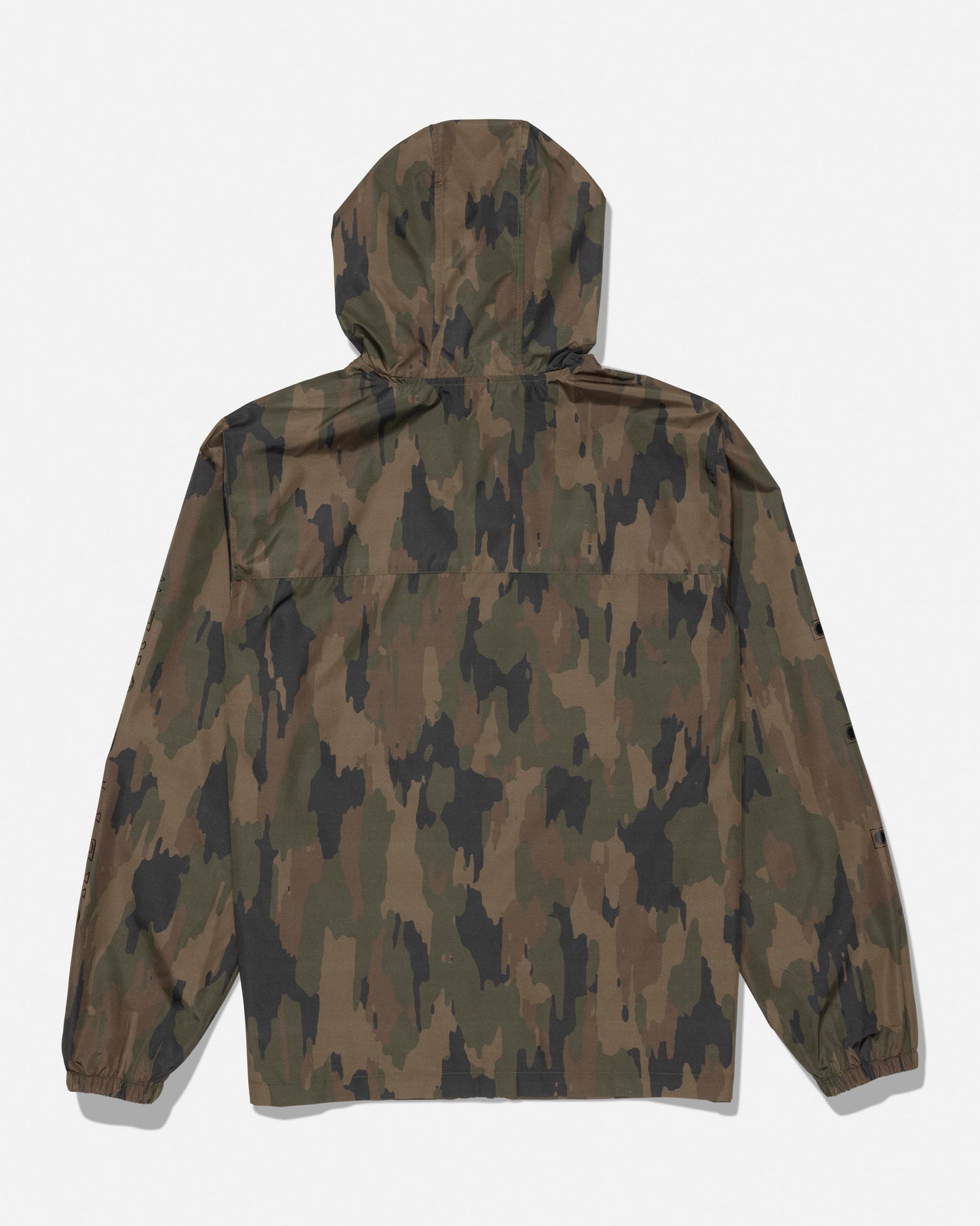 The Salty Crew Surface Windbreaker Jacket - Ranger is a hooded polyester jacket in a brown and green camouflage pattern, shown from the back. It features long sleeves with elastic cuffs and zippered pockets for secure storage.