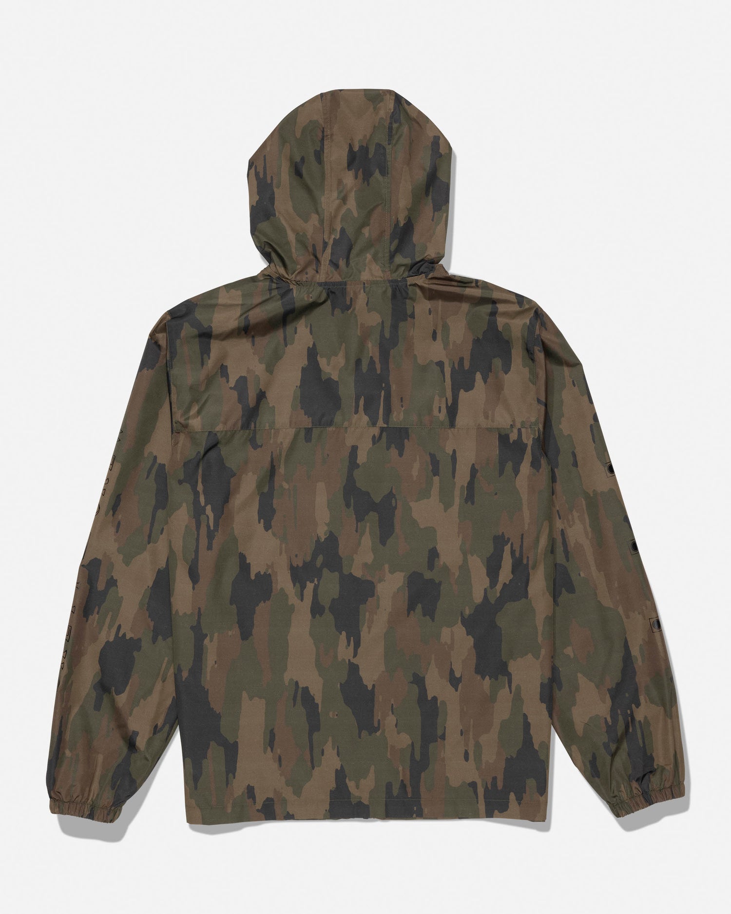 The Salty Crew Surface Windbreaker Jacket - Ranger is a hooded polyester jacket in a brown and green camouflage pattern, shown from the back. It features long sleeves with elastic cuffs and zippered pockets for secure storage.