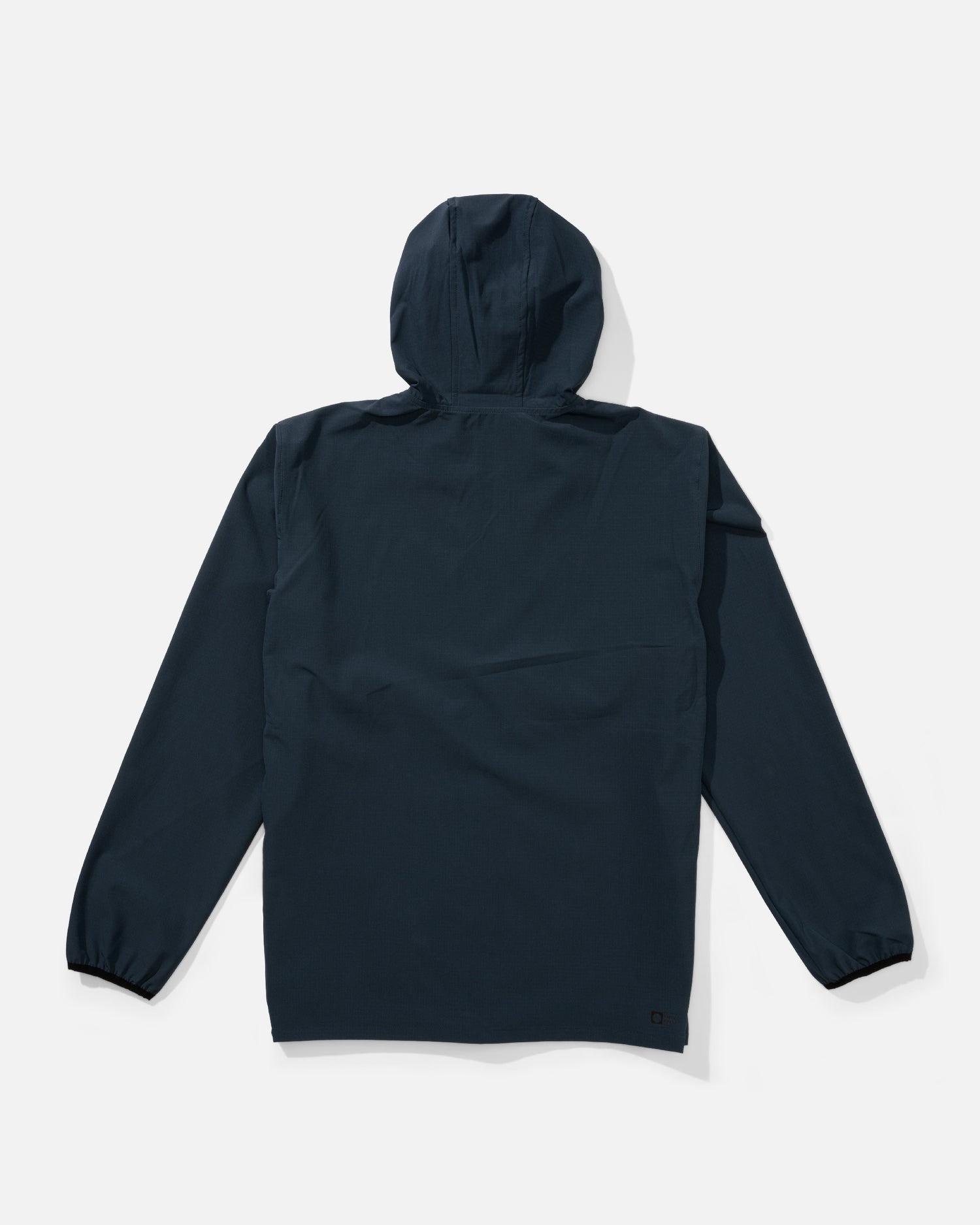 Back view of the Stowaway Windbreaker Jacket - Midnight Navy. 