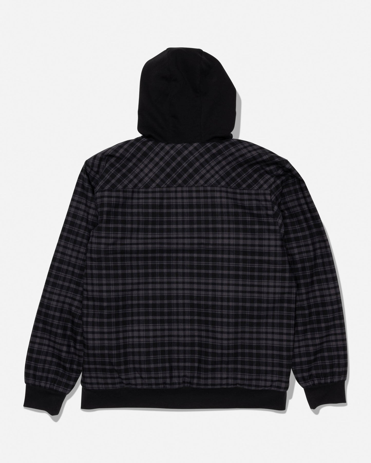 The Salty Crew Fathom Jacket - Pirate Black is a black and gray plaid, mid-weight twill jacket with a solid black hood and black cuffs, displayed from the back against a white background.