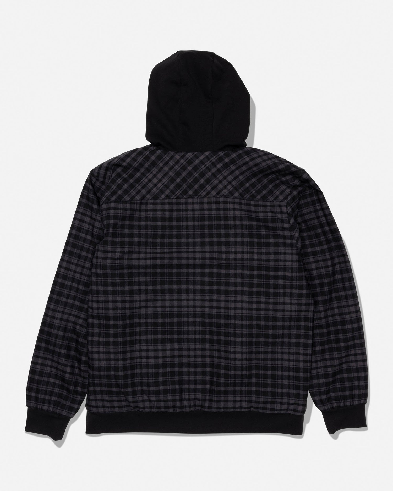 The Salty Crew Fathom Jacket - Pirate Black is a black and gray plaid, mid-weight twill jacket with a solid black hood and black cuffs, displayed from the back against a white background.