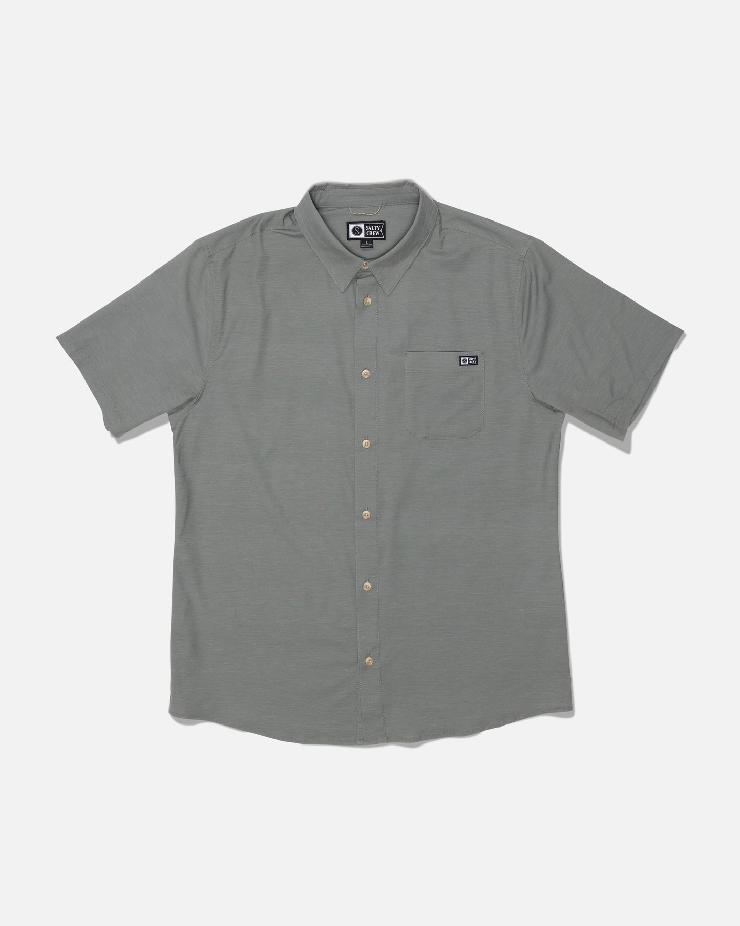 Introducing the Salty Crew Drifter UV Button Up in Agave—a short-sleeve, light gray shirt featuring a collared neckline and a left chest pocket accented with a small rectangular logo tag above it. Made from quick-dry fabric and offering UPF 50+ sun protection, this shirt ensures comfort and safety during sunny days.