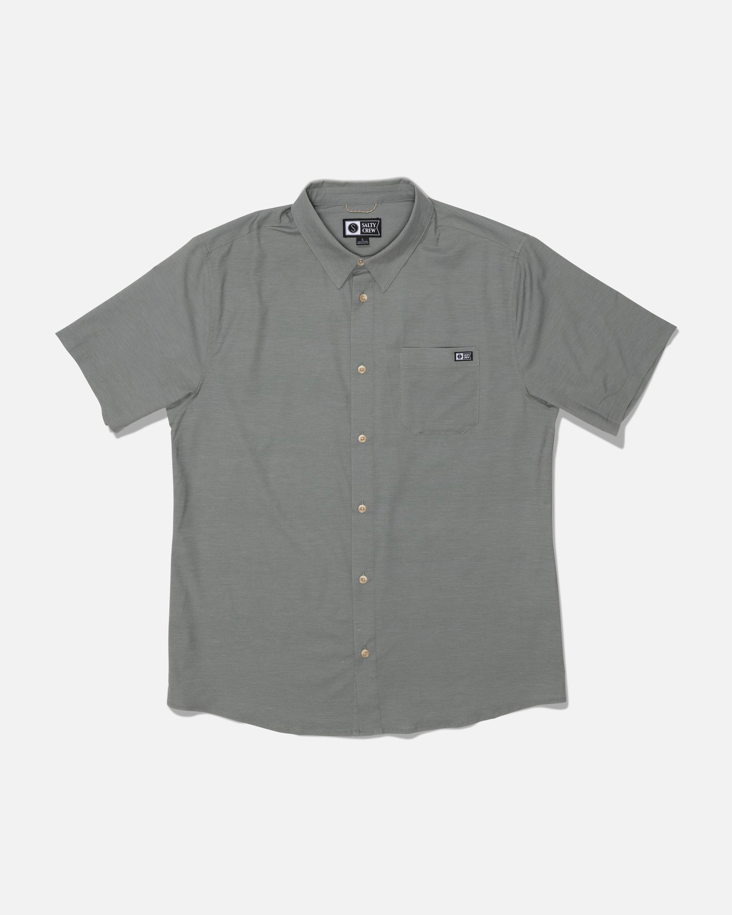Introducing the Salty Crew Drifter UV Button Up in Agave—a short-sleeve, light gray shirt featuring a collared neckline and a left chest pocket accented with a small rectangular logo tag above it. Made from quick-dry fabric and offering UPF 50+ sun protection, this shirt ensures comfort and safety during sunny days.