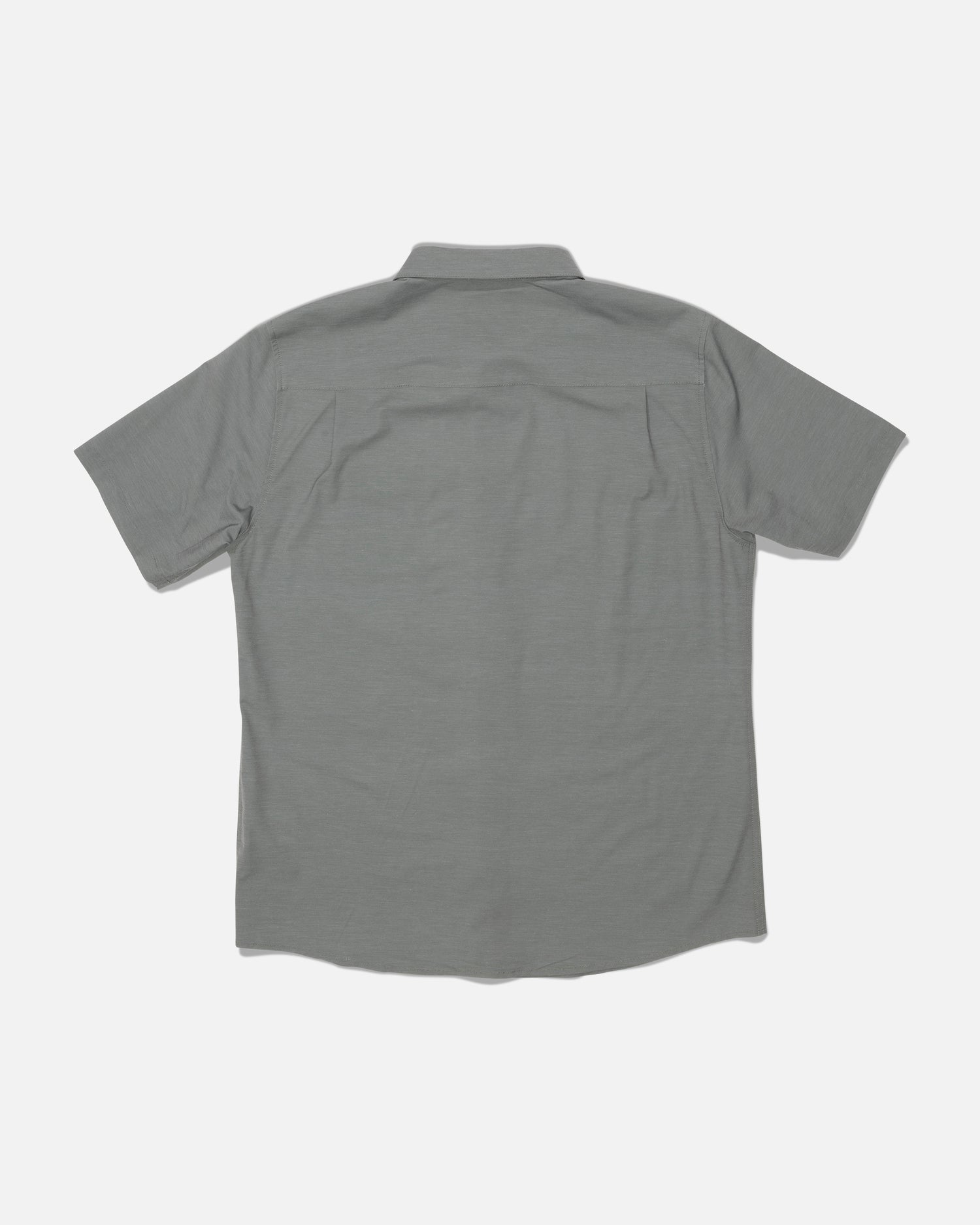 The Salty Crew Drifter UV Button Up in Agave is displayed from the back on a white background. This gray short-sleeve shirt features a collar and a clean design with no visible logos or patterns. Made with quick dry fabric and advanced moisture wicking technology, it’s designed to keep you comfortable all day long.