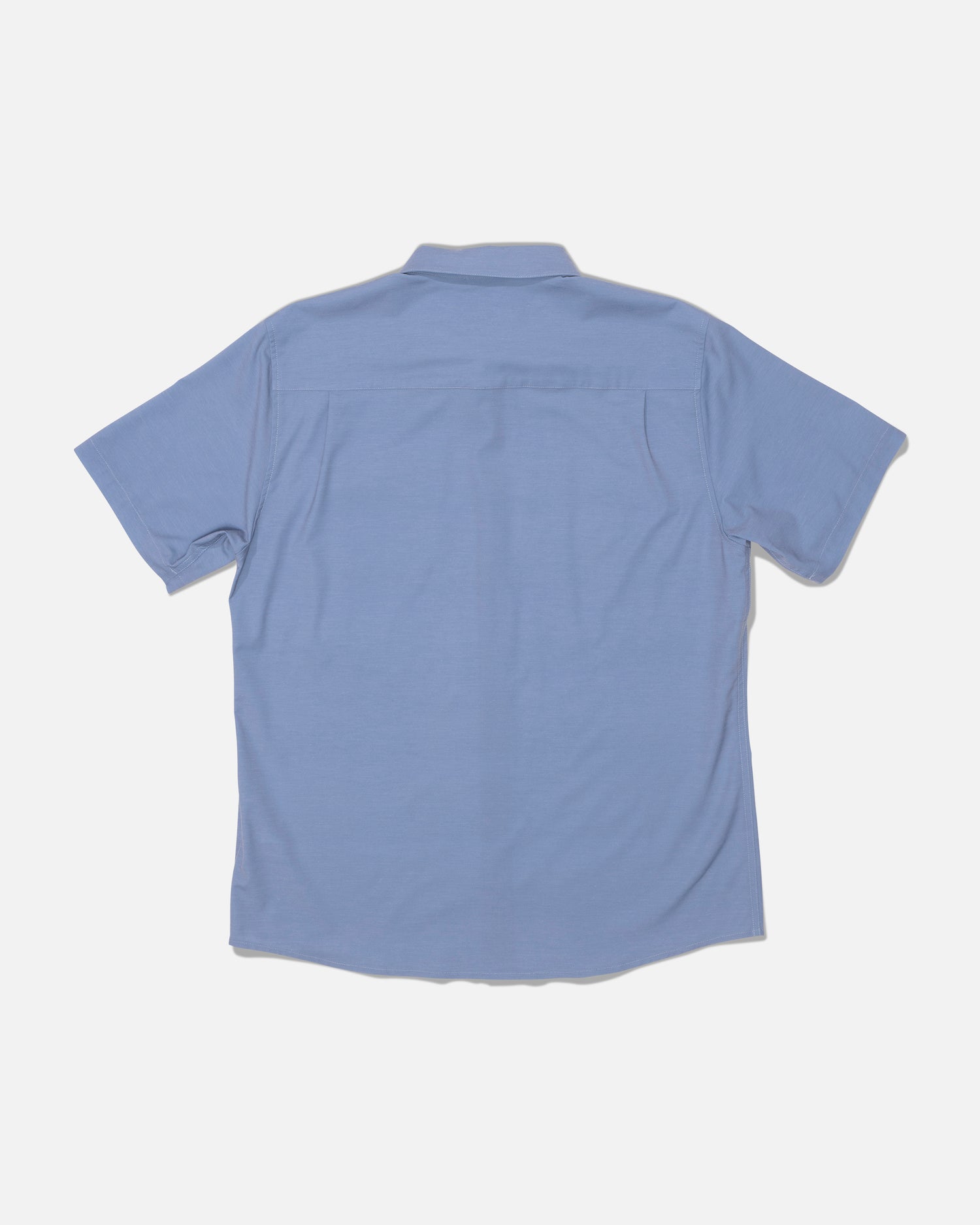 The Salty Crew Drifter UV Button Up in Hitch Blue is displayed laid flat with the back side facing up against a plain white background. Featuring UPF 50+ sun protection and moisture-wicking fabric, this short-sleeve collared shirt provides comfort and coverage for sunny days.