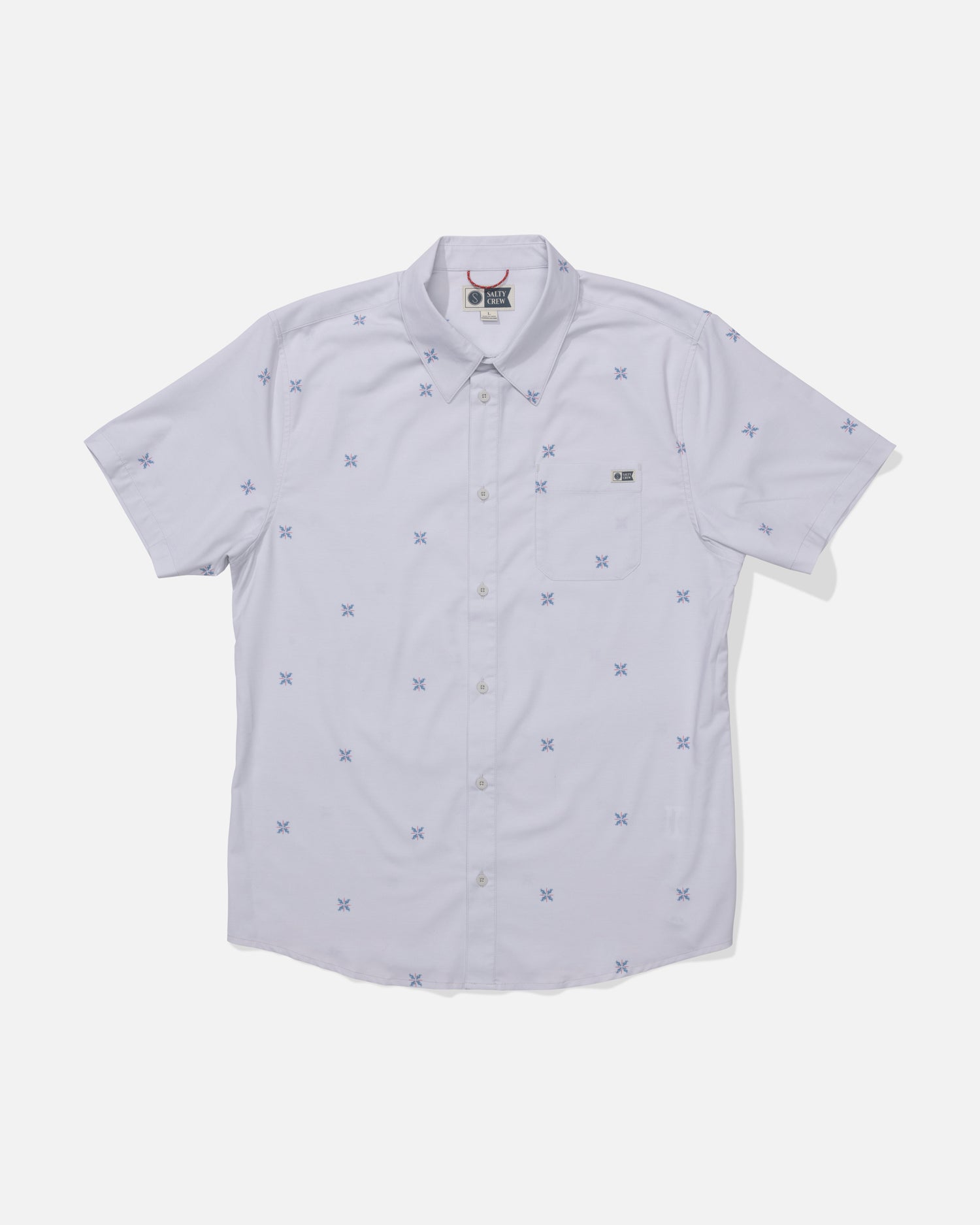 The Salty Crew Drifter UV Button Up in Light Grey is a collared, short-sleeve shirt with small blue embroidered patterns, moisture-wicking fabric, and a rectangular logo patch on the left chest.