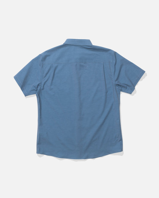 Back view of the Drifter UV Button Up - Mid Blue. 