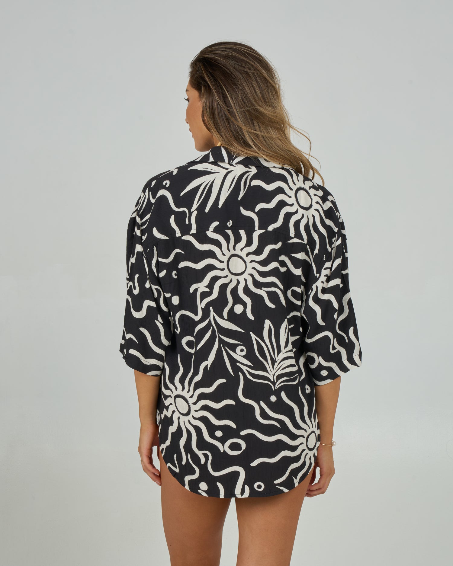 Back view of the Cabana Tunic - Black. 