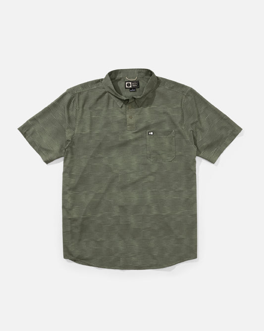 Front view of the Breezer Perf Polo - Oil Green. 