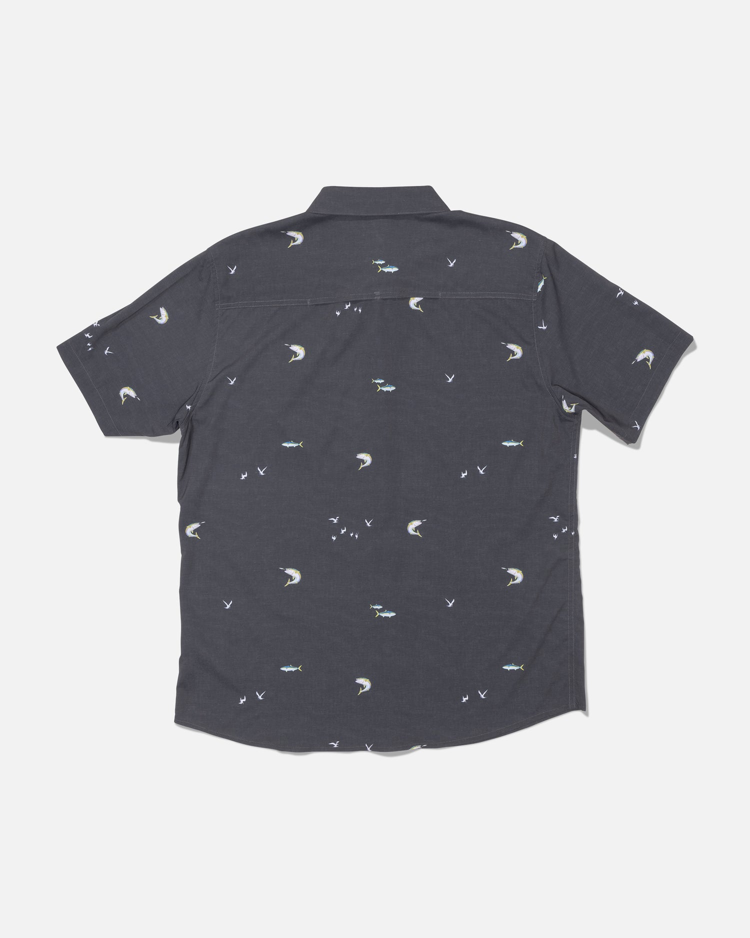 The Salty Crew Flagship UV Button Up in Dark Grey features small embroidered moons, birds, and fish scattered across the back. Crafted with quick-dry, moisture-wicking fabric that offers UPF 50+ sun protection, this short-sleeve shirt is designed to keep you cool and comfortable all day long. The shirt is displayed laid flat on a white background, showing the back side.