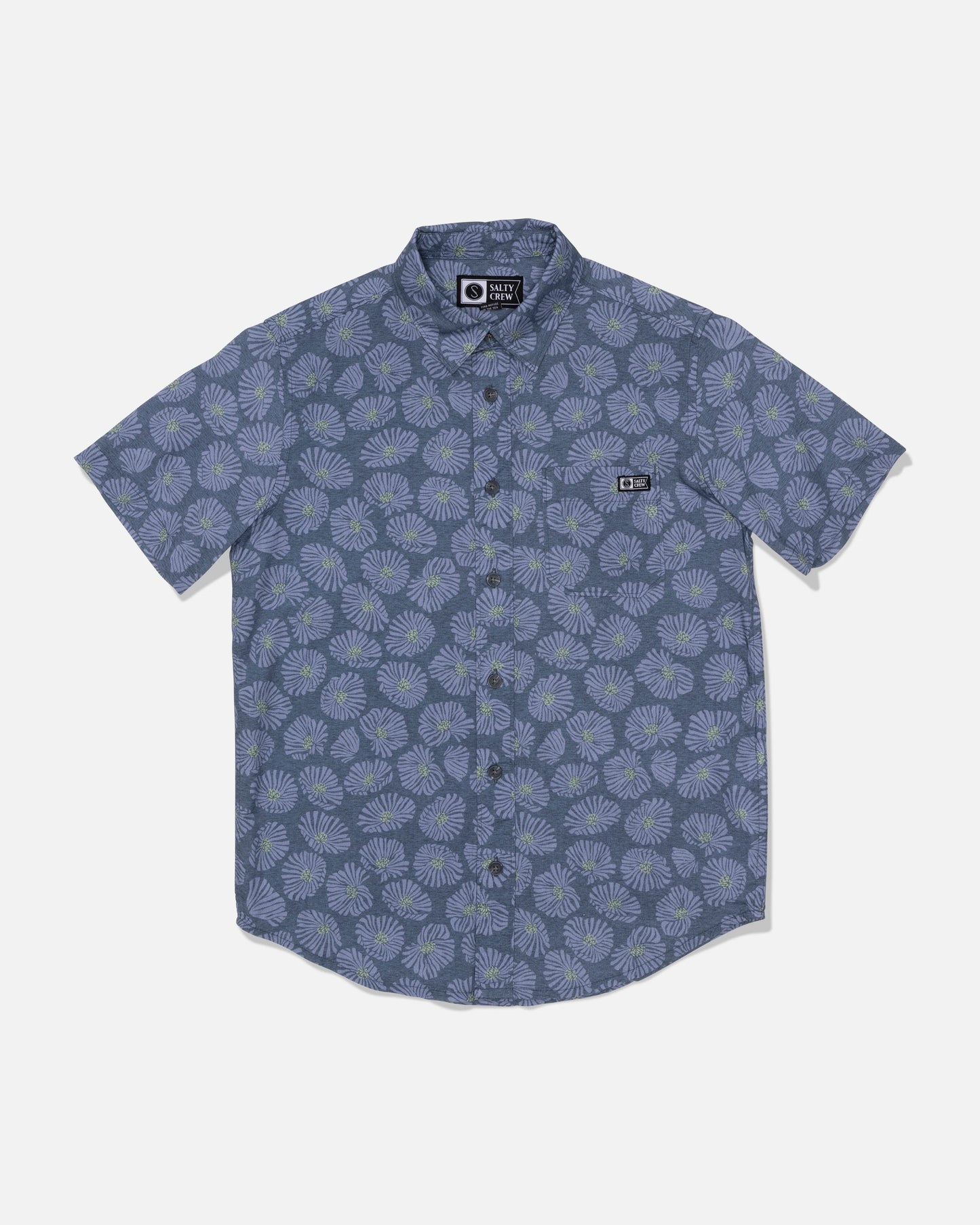 Introducing the Salty Crew Boys Button Up in Hitch Blue—a short-sleeve button-up shirt featuring a blue background with an allover light blue floral pattern. Made from a comfortable cotton blend, this shirt includes a classic collar and a small chest pocket adorned with a black and white Salty Crew label.