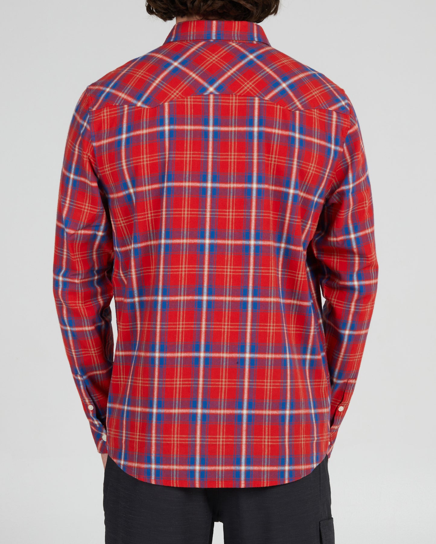 On body back of the Herdsman Red Flannel