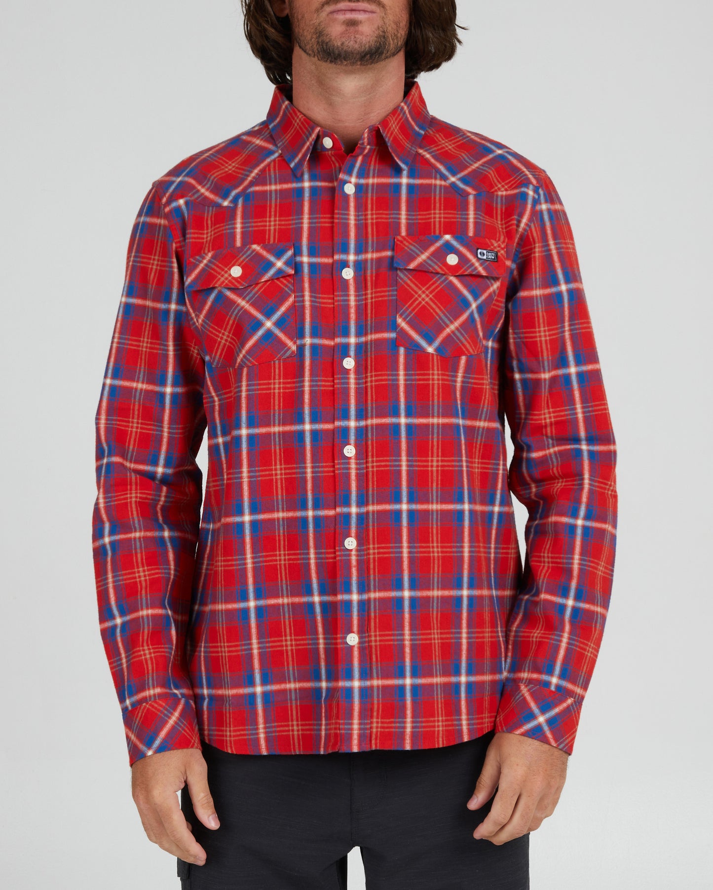 On body front of the Herdsman Red Flannel