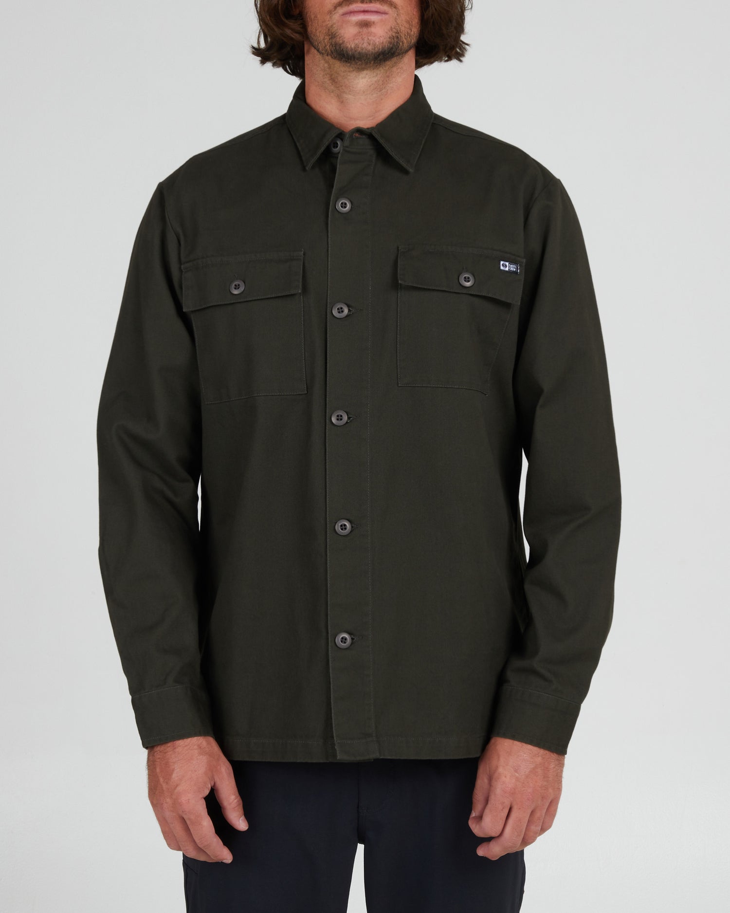On body front of the Ranger Faded Black L/S Woven