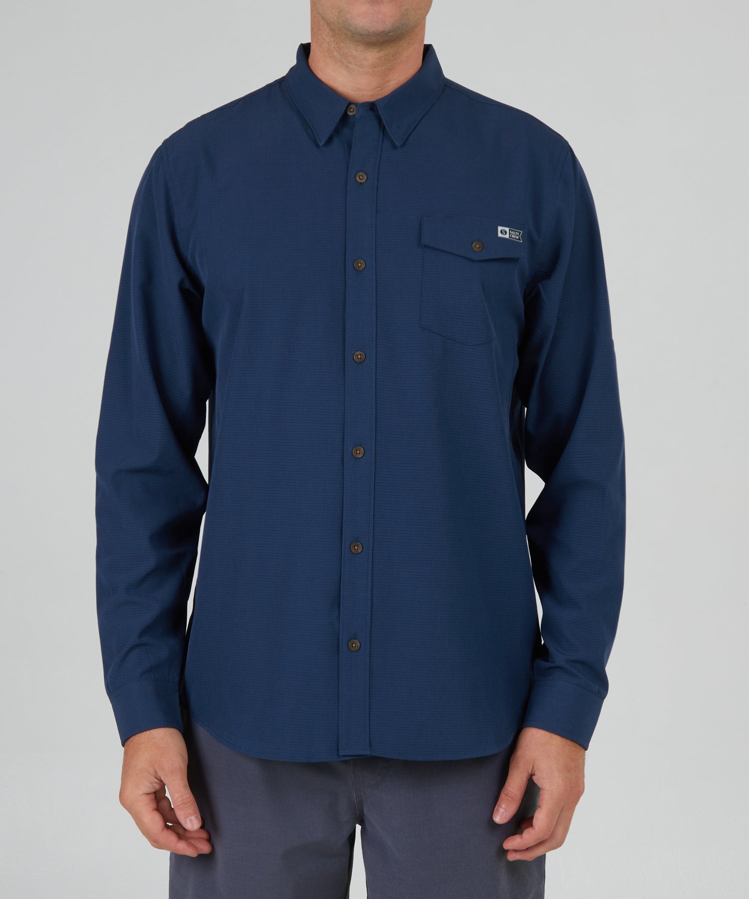 front view of Skipper Perforated Navy L/S Tech Woven