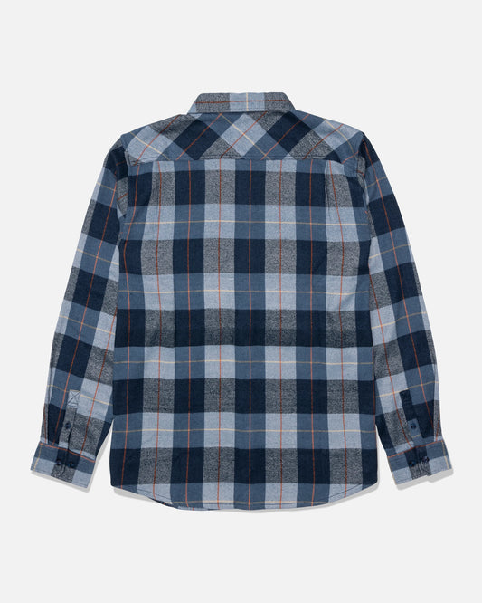 The Salty Crew Daybreak Flannel - Mid Blue is a long-sleeve shirt made from mid-weight twill, featuring a blue, gray, and black yarn-dyed plaid pattern. It is shown from the back against a white background.