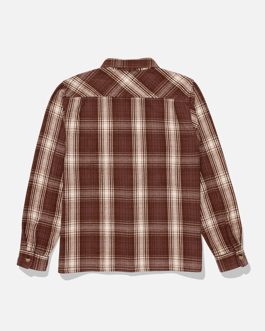 The Salty Crew Windward Flannel - Deep Brown is a long-sleeve, button-up shirt made from heavyweight cotton twill with a brown and beige plaid pattern. Shown from the back against a white background, it features classic chest pockets and an authentic garment wash for enhanced comfort and style.