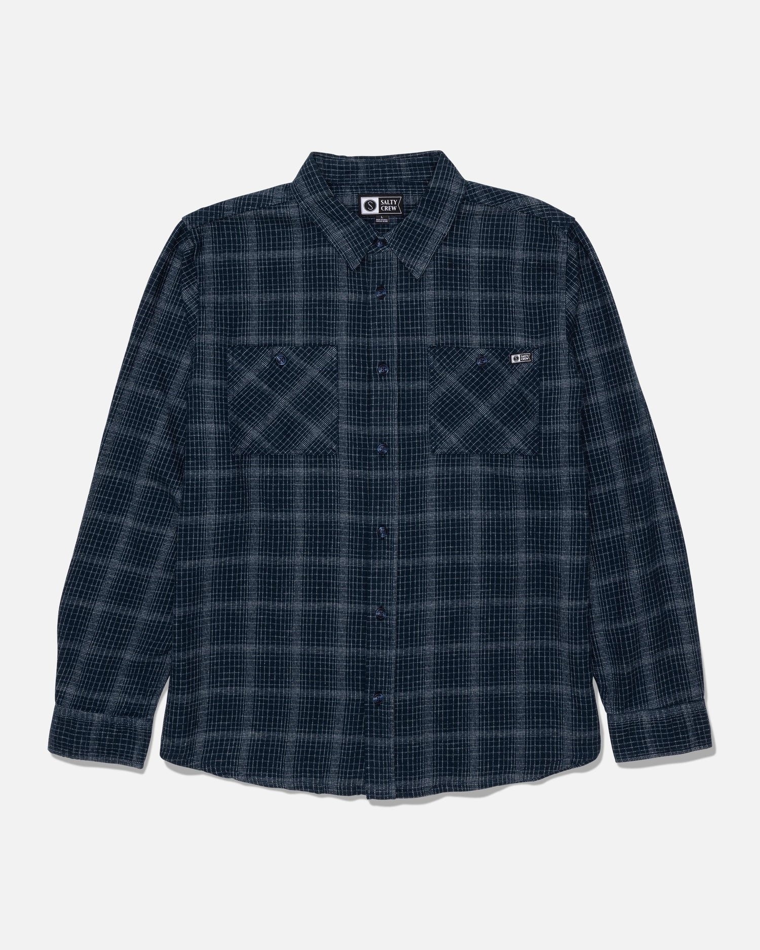 The Salty Crew Fine Line Flannel - Navy is a long-sleeve, button-up flannel shirt in dark blue and black plaid, featuring two chest pockets and displayed flat on a white background.