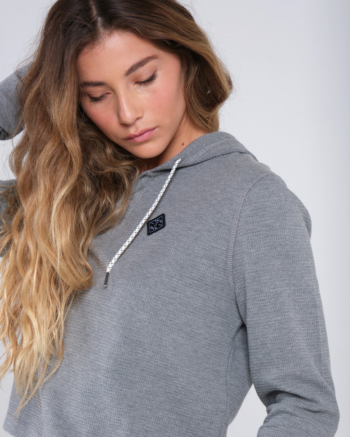 On body close up of the Tippet Henley Heather Grey Hoody