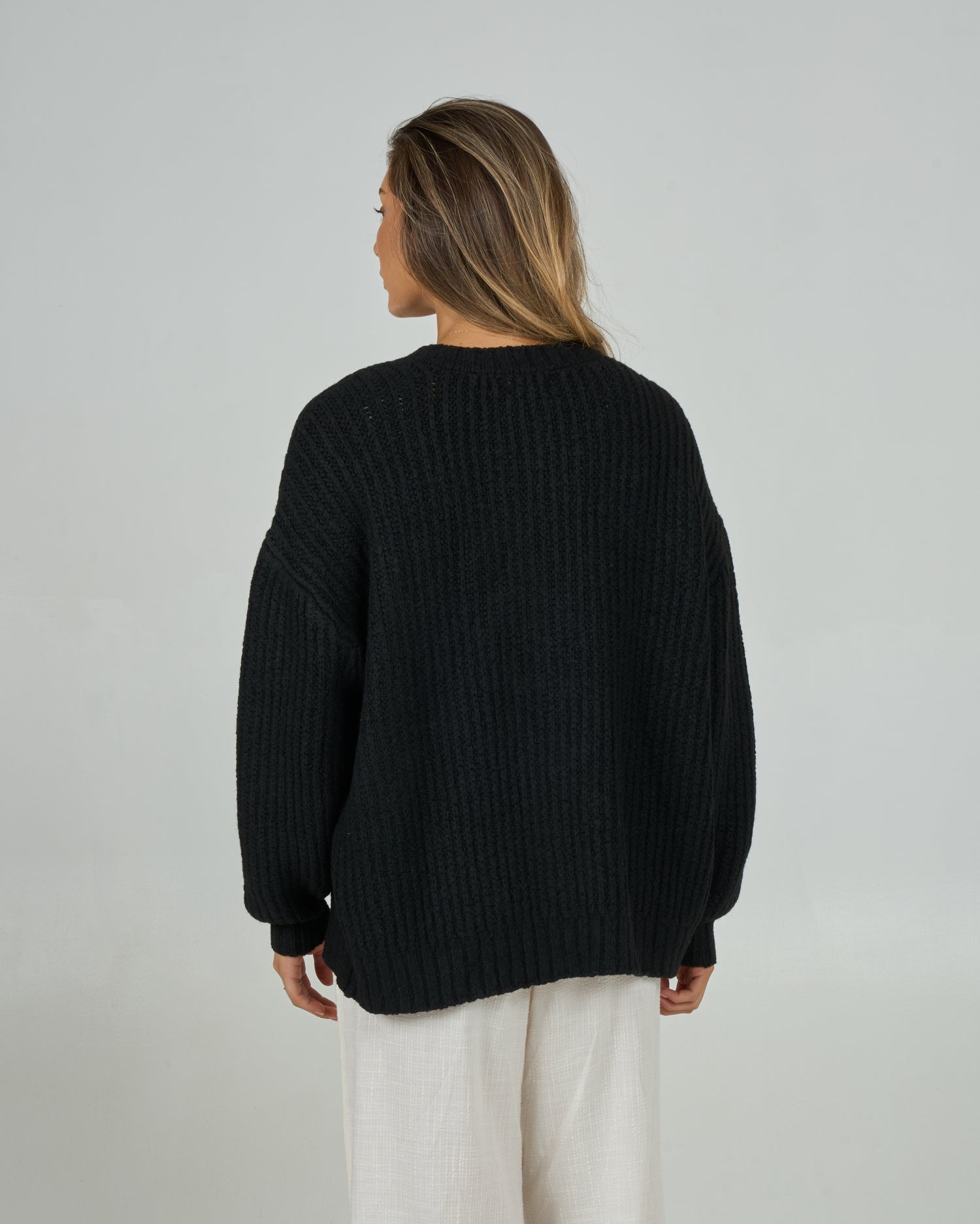Back view of the Mariner Cardigan - Black. 