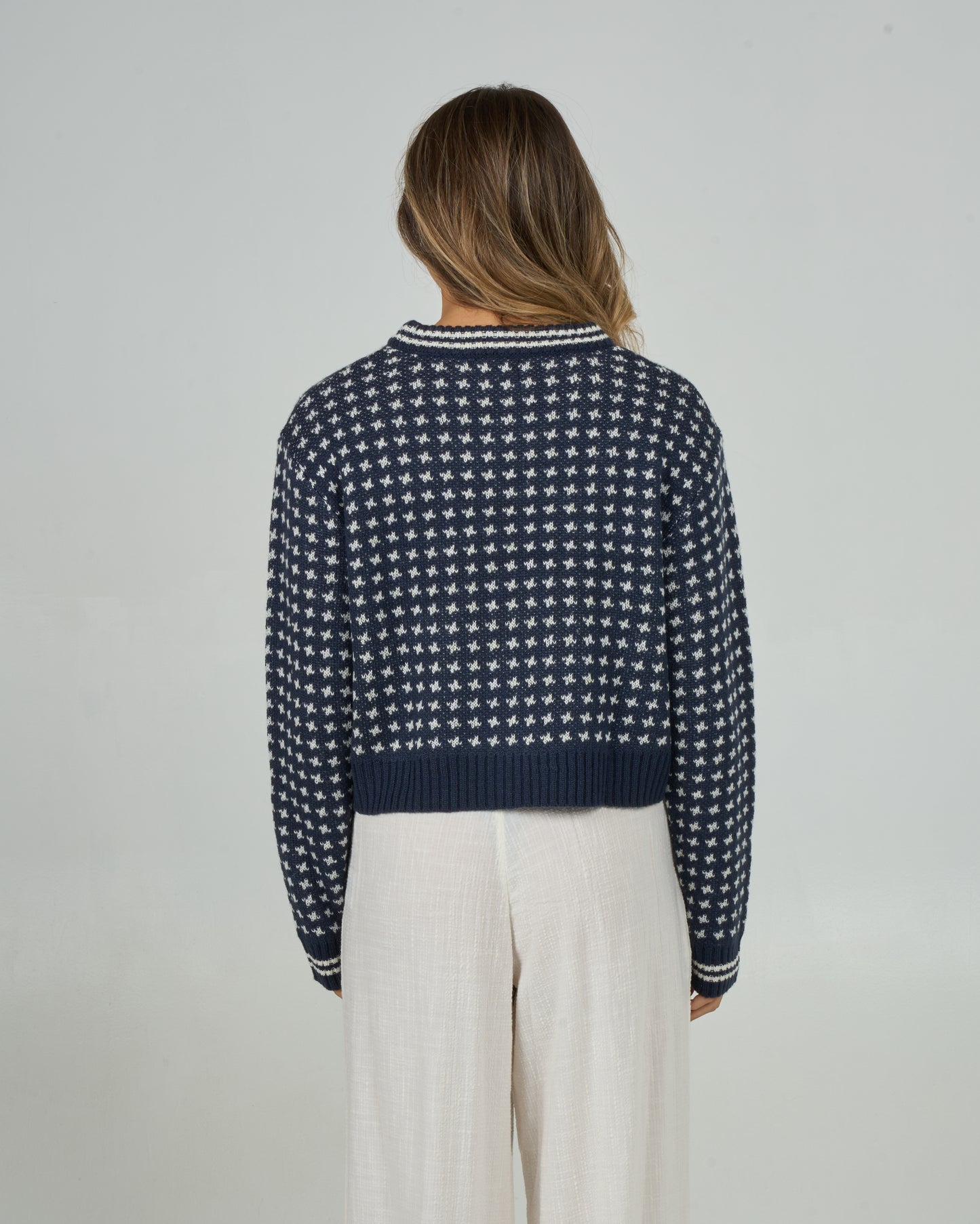 Back view of the Starlight Sweater - Dark Navy. 