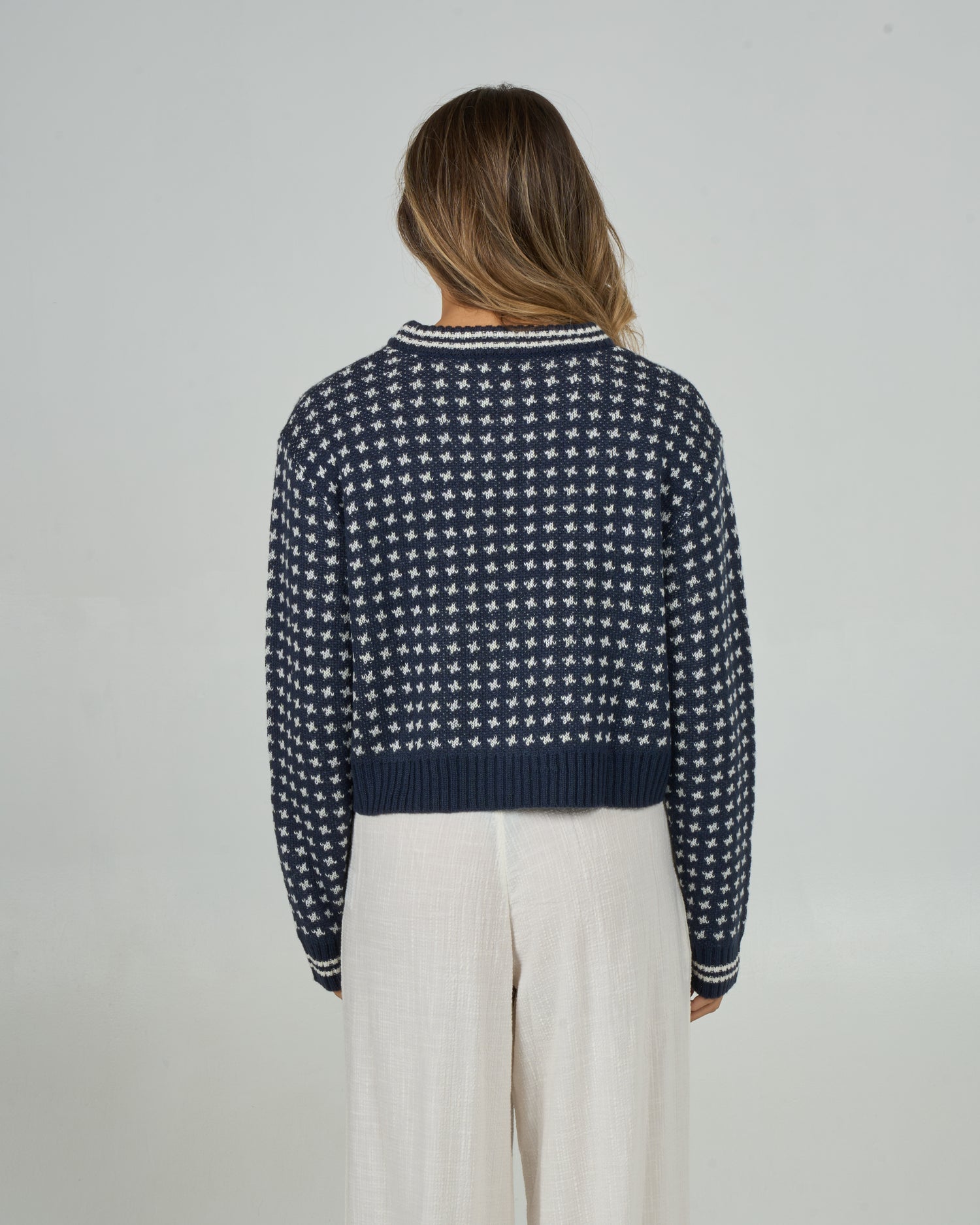Back view of the Starlight Sweater - Dark Navy. 