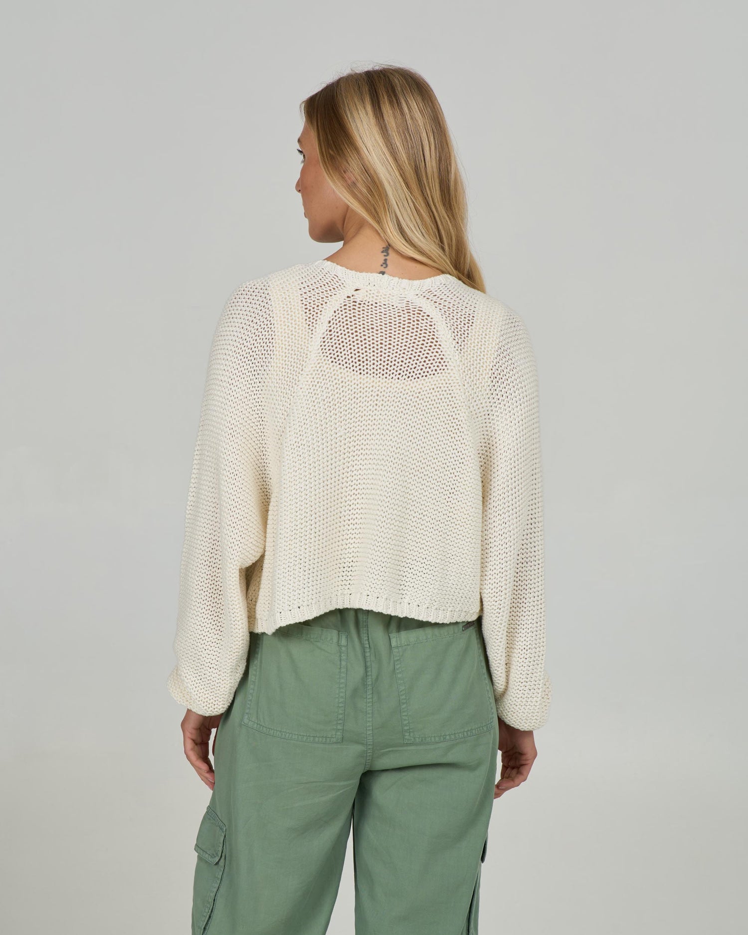 Back view of the Navigator Cardigan - Off White. 