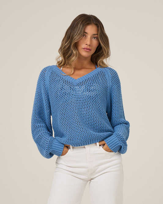 Front view of the Surge Sweater - Ash Blue. 