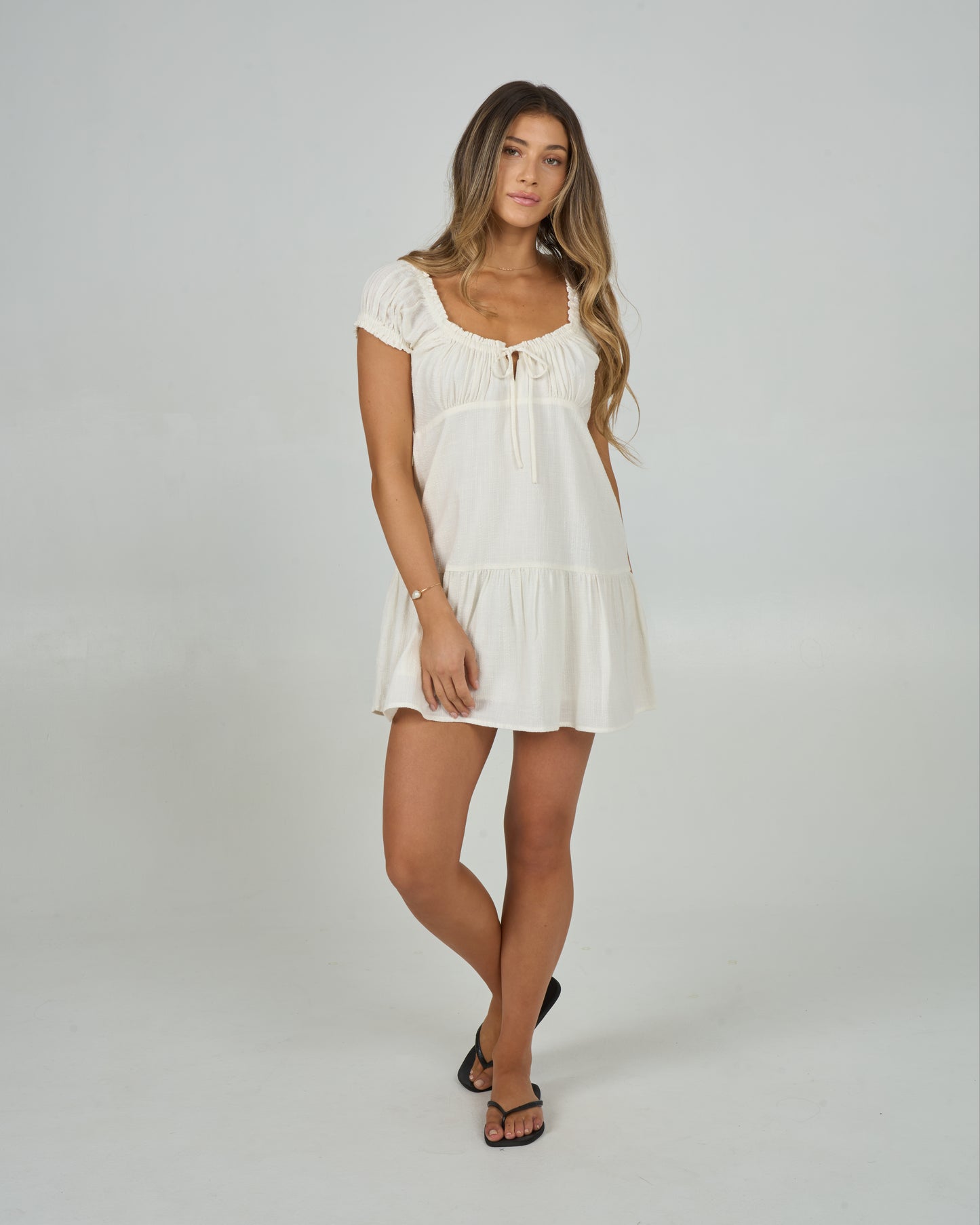 Front view of the Coastal Dress - Off White. 