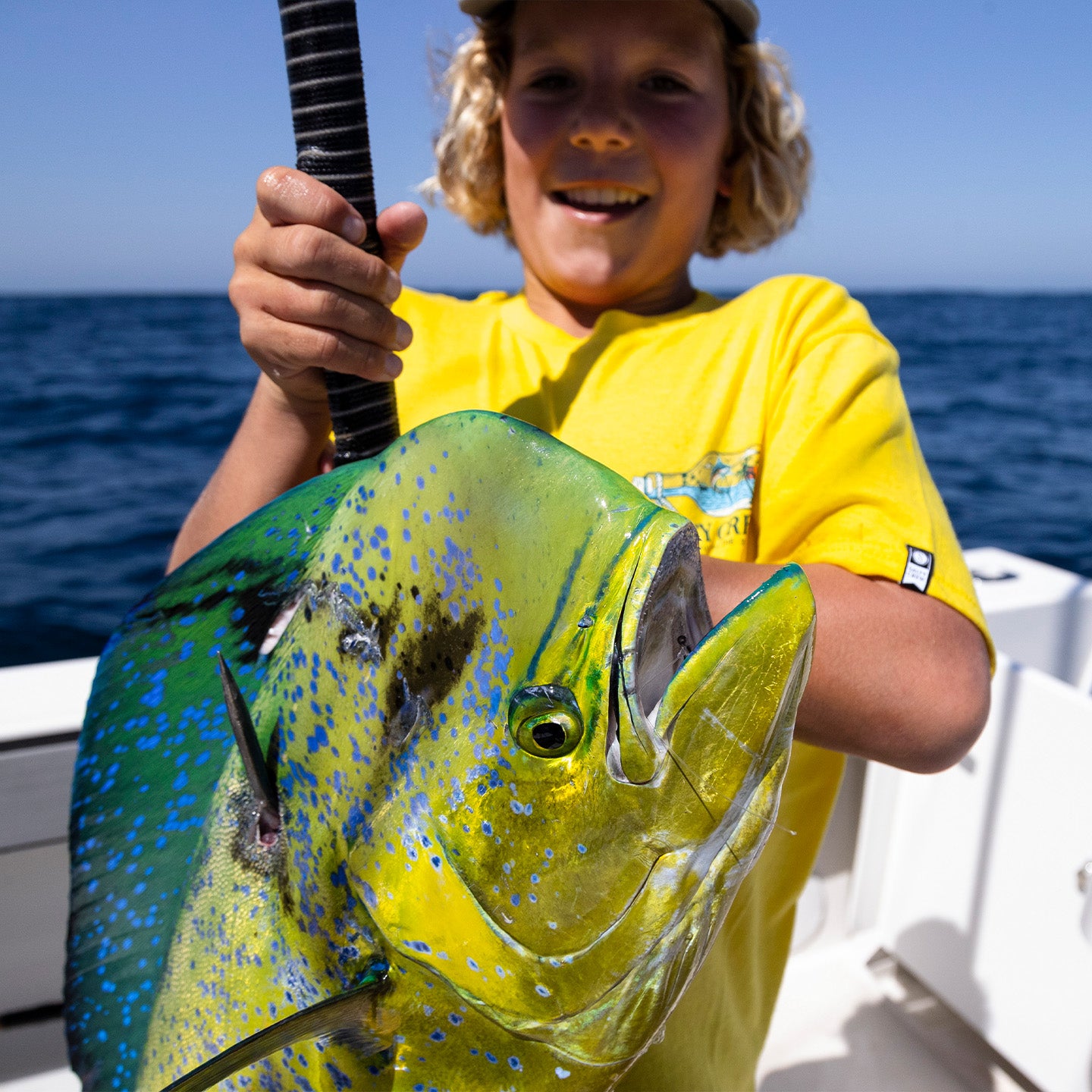 Lifestyle shot of kid with fish 