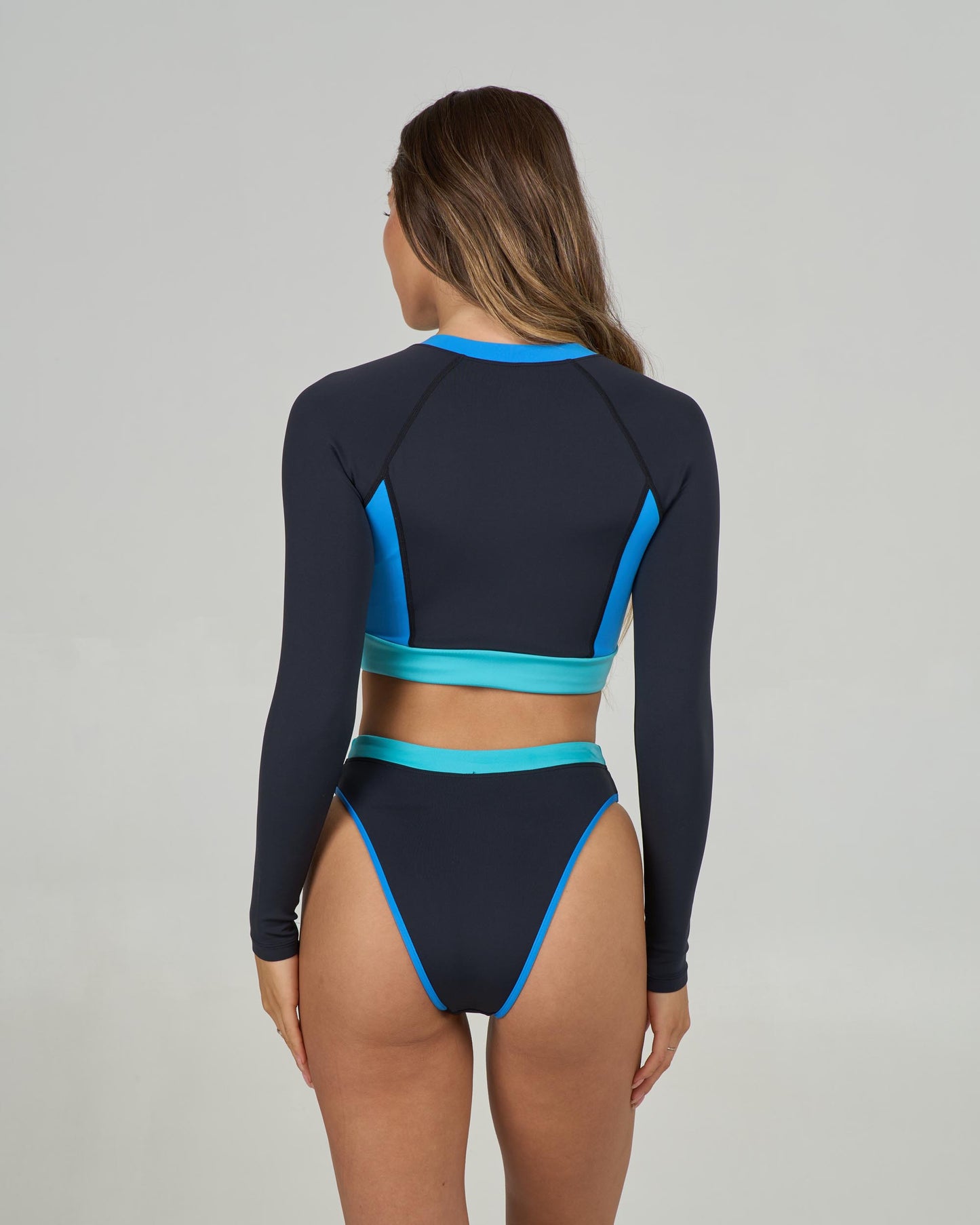 Back view of the Surf Break Rashguard - Black. 