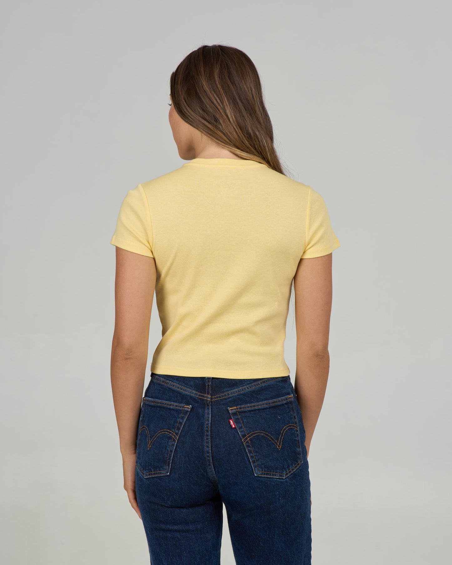 Back view of the Keyhole Baby Tee - Sunshine. 