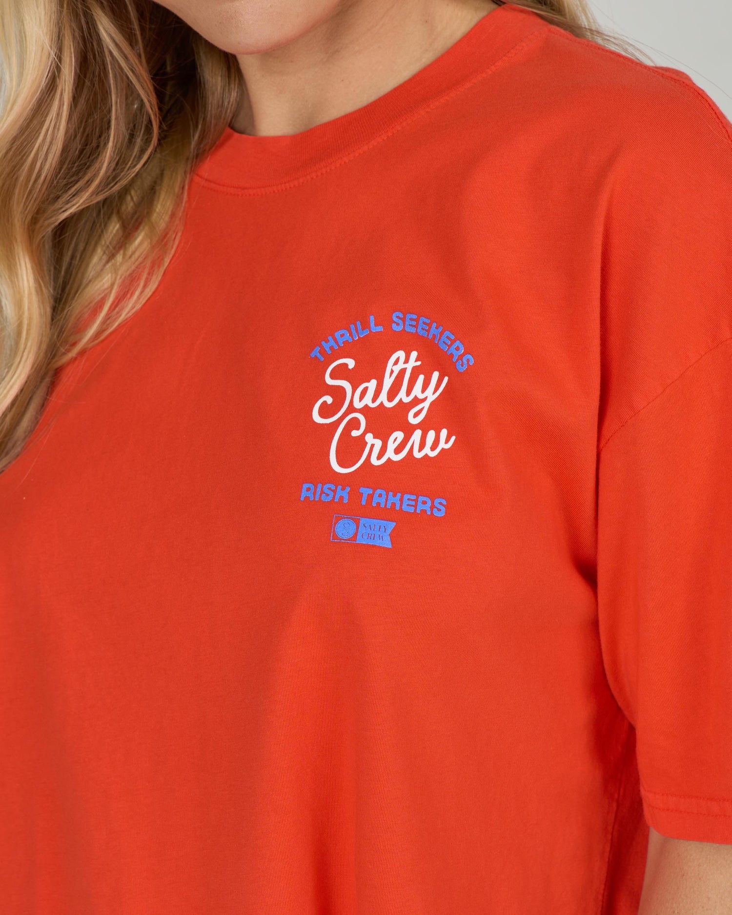Detail front view of the Salty Skimmer Tee - Chili Pepper. 