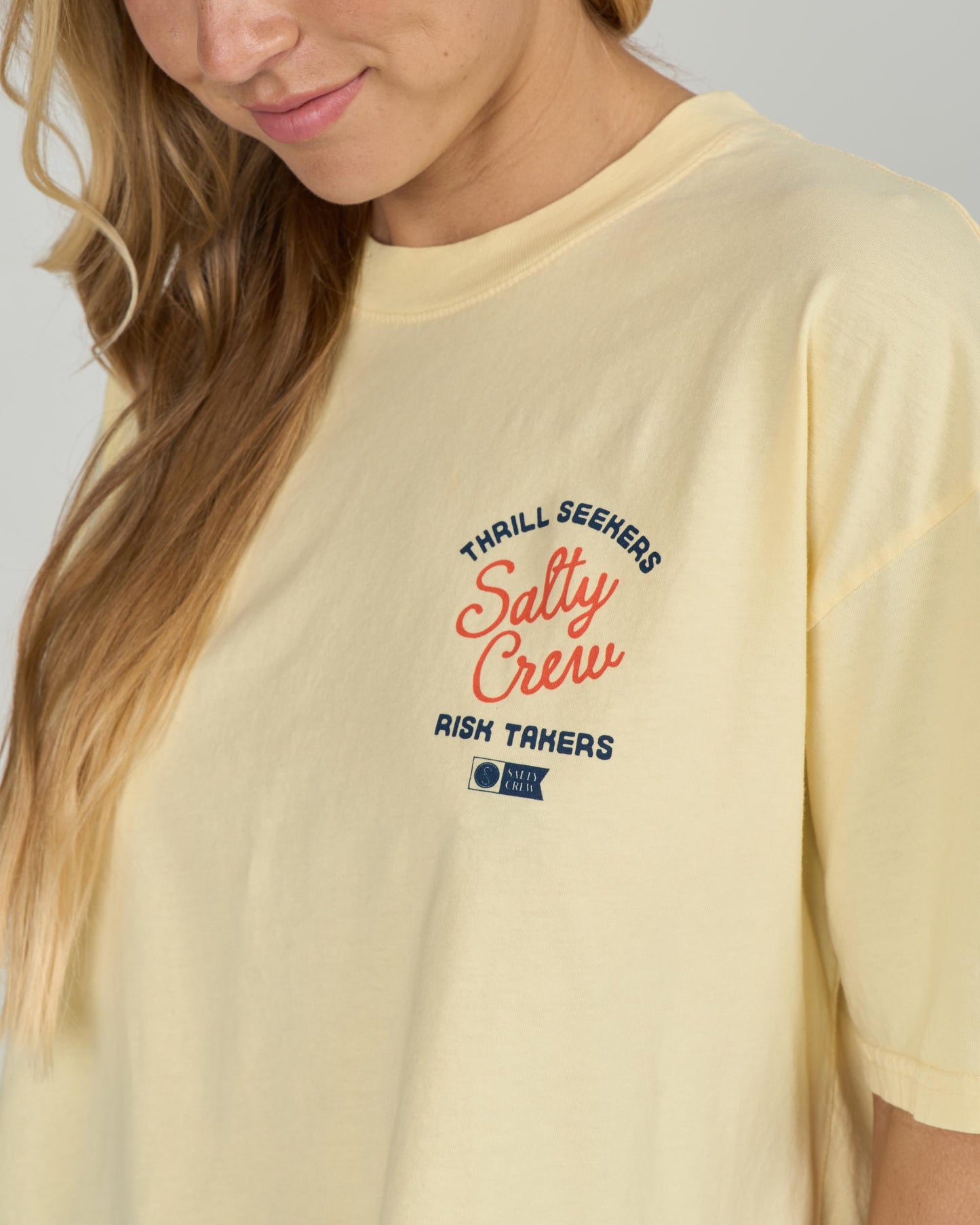 Detail front view of the Salty Skimmer Tee - Sunshine. 