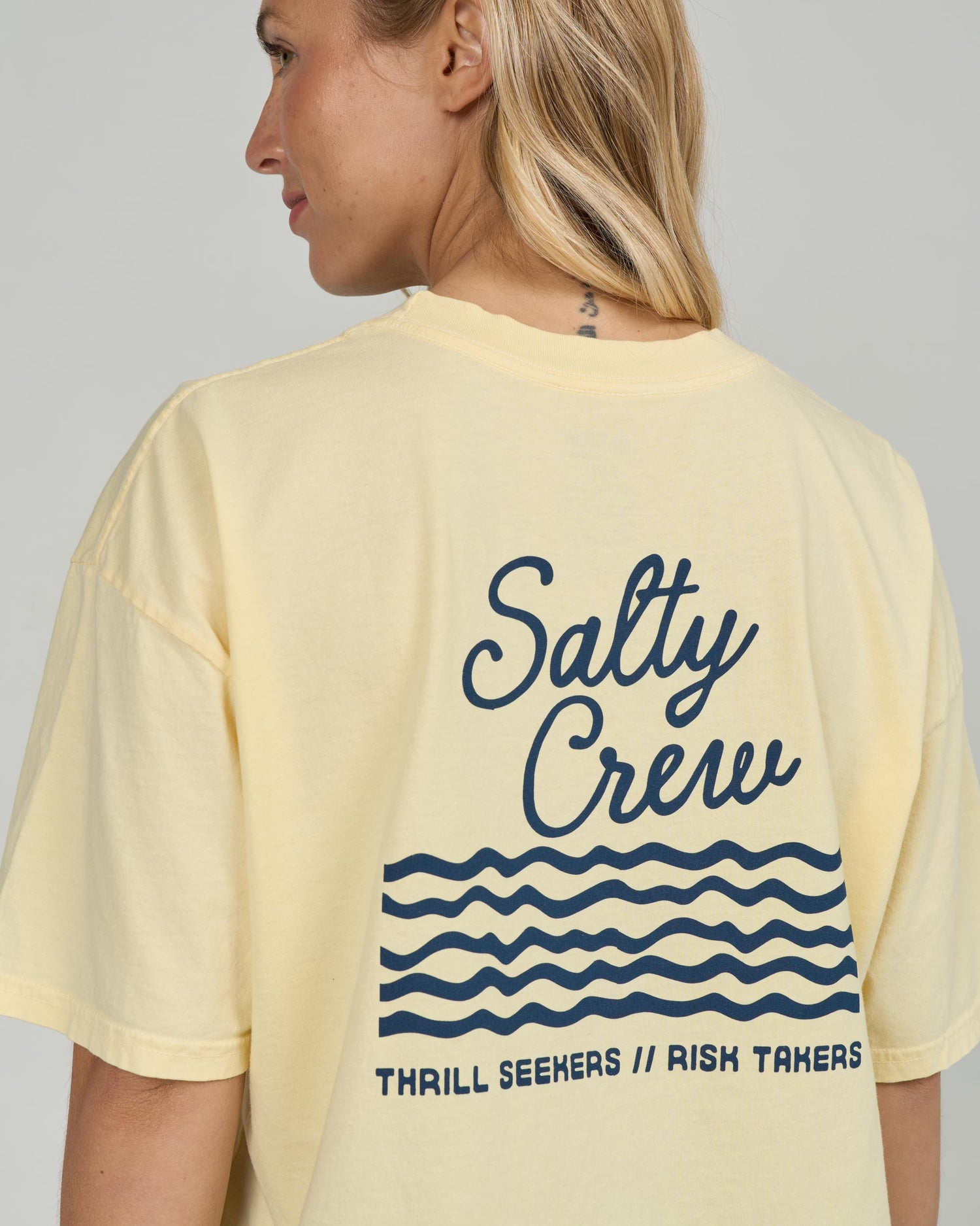 Detail back view of the Salty Skimmer Tee - Sunshine. 
